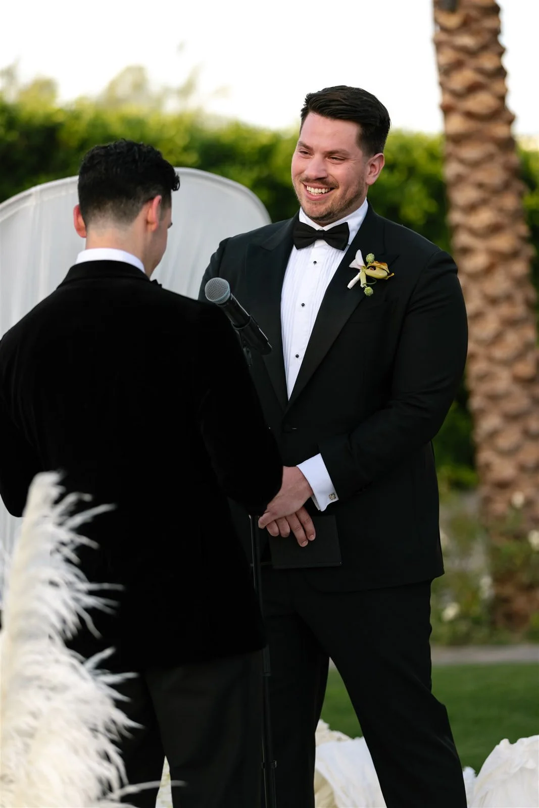 Two grooms during their Cache Estate wedding ceremony in Indio, CA, by Palm Springs wedding planner COJ Events