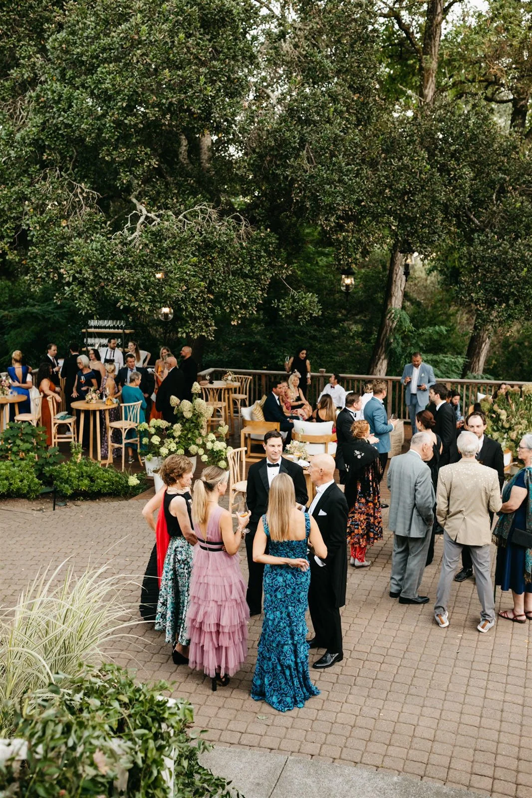 Guests enjoying cocktail hour on the grounds of The Madrona -Planned by COJ Events-Palm Springs Destination Wedding