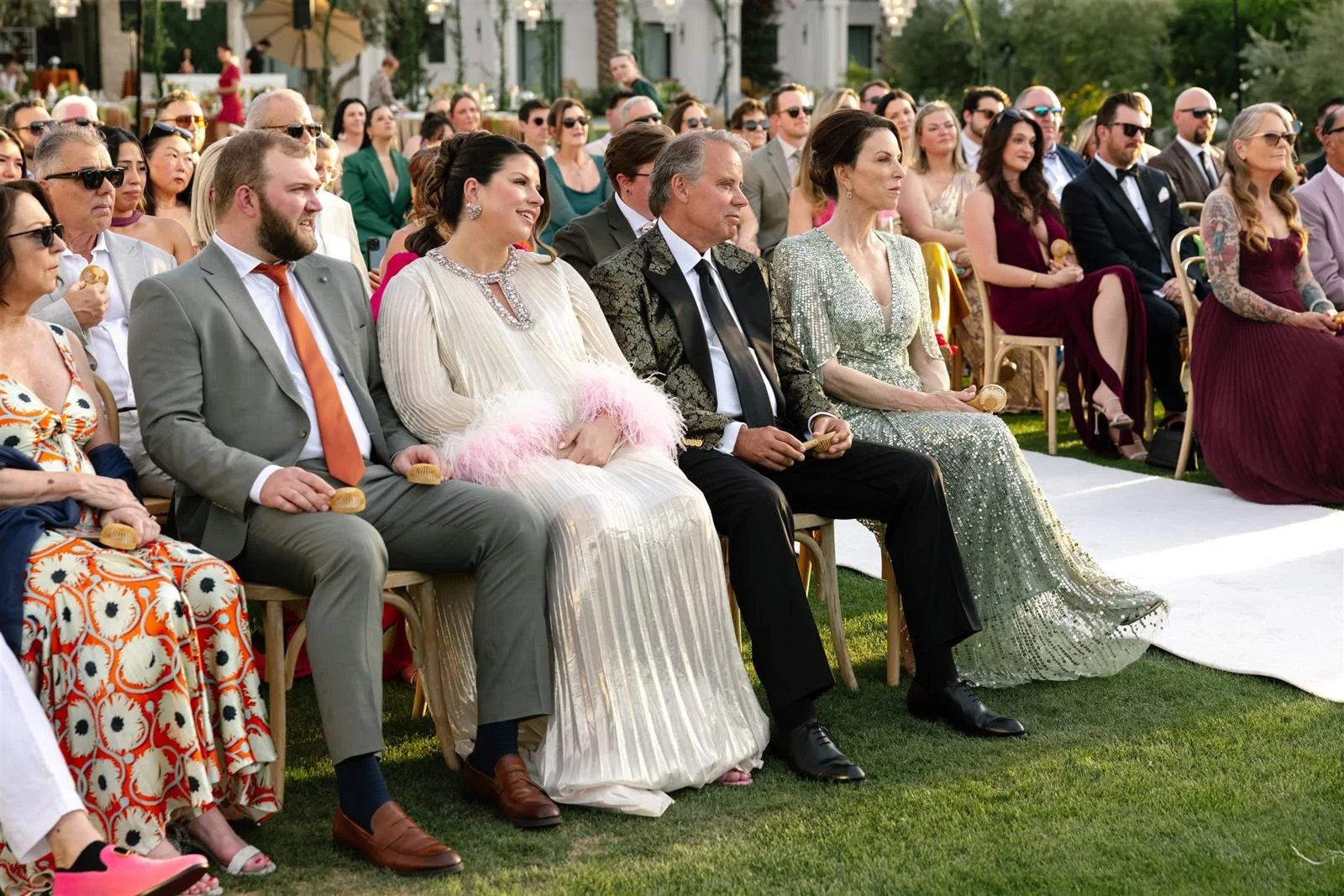 Friends and family during a Cache Estate wedding ceremony in Indio, CA, by Palm Springs wedding planner COJ Events