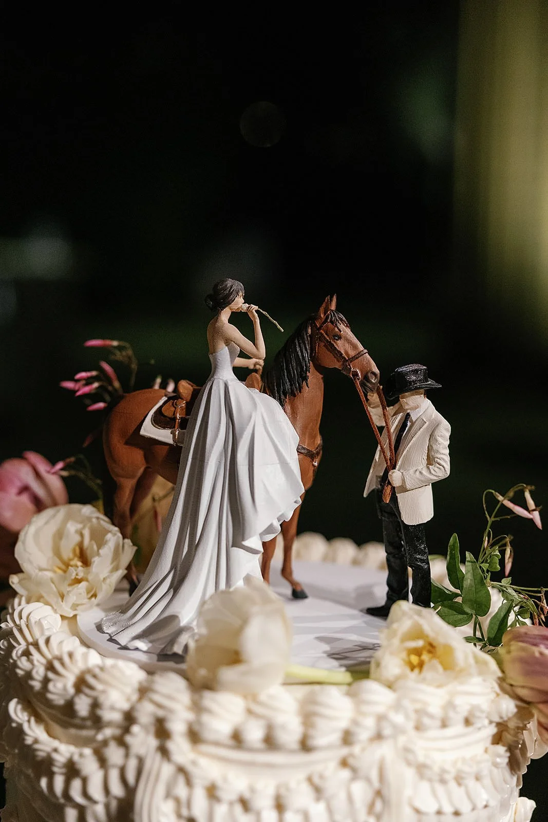 Cowboy themed cake topper at a Merv Griffin Estate wedding reception designed by COJ Events