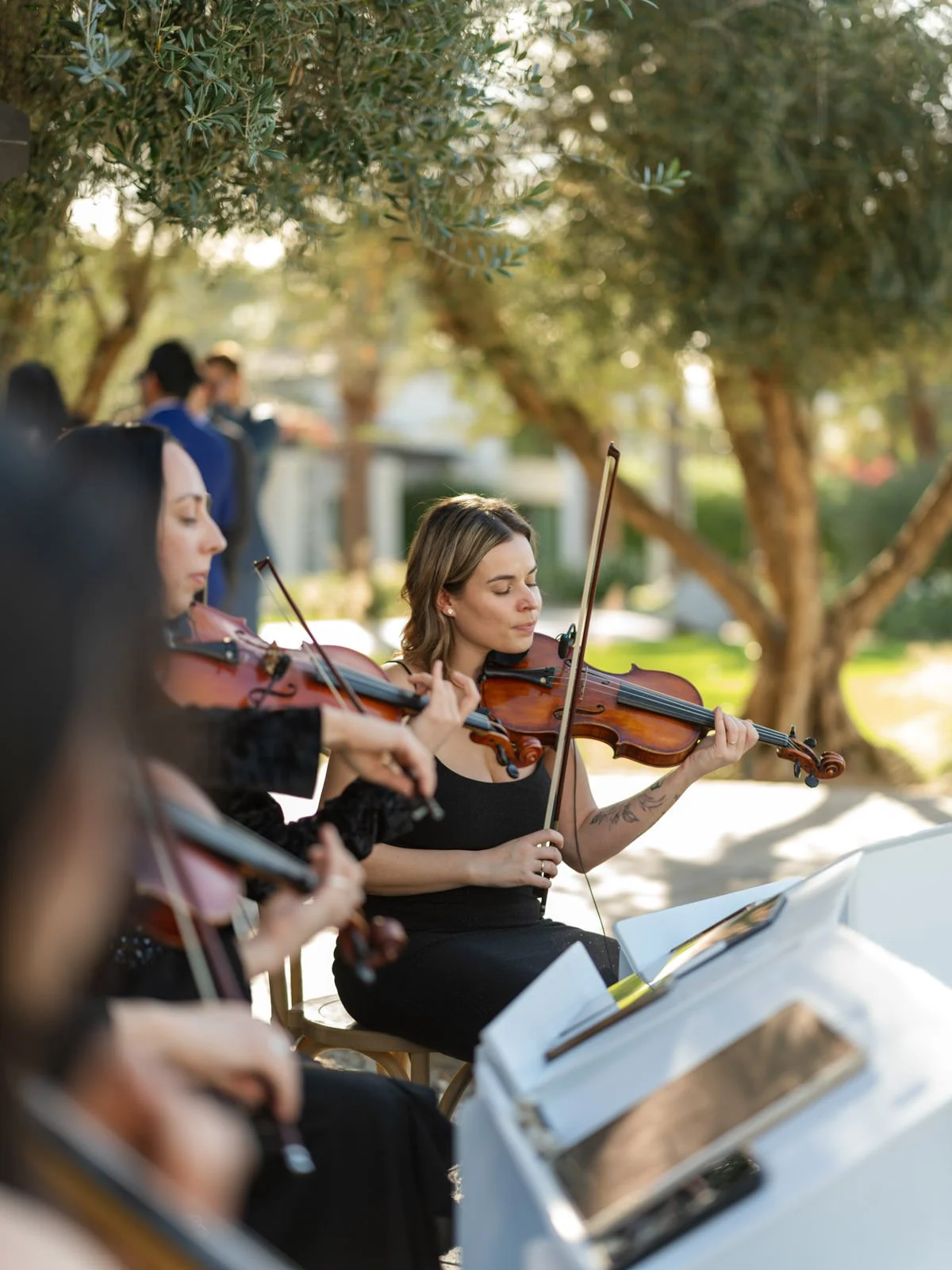 Musicians playing during cocktail hour at Cache Estate Wedding in Indio, CA, by Palm Springs wedding planner COJ Events