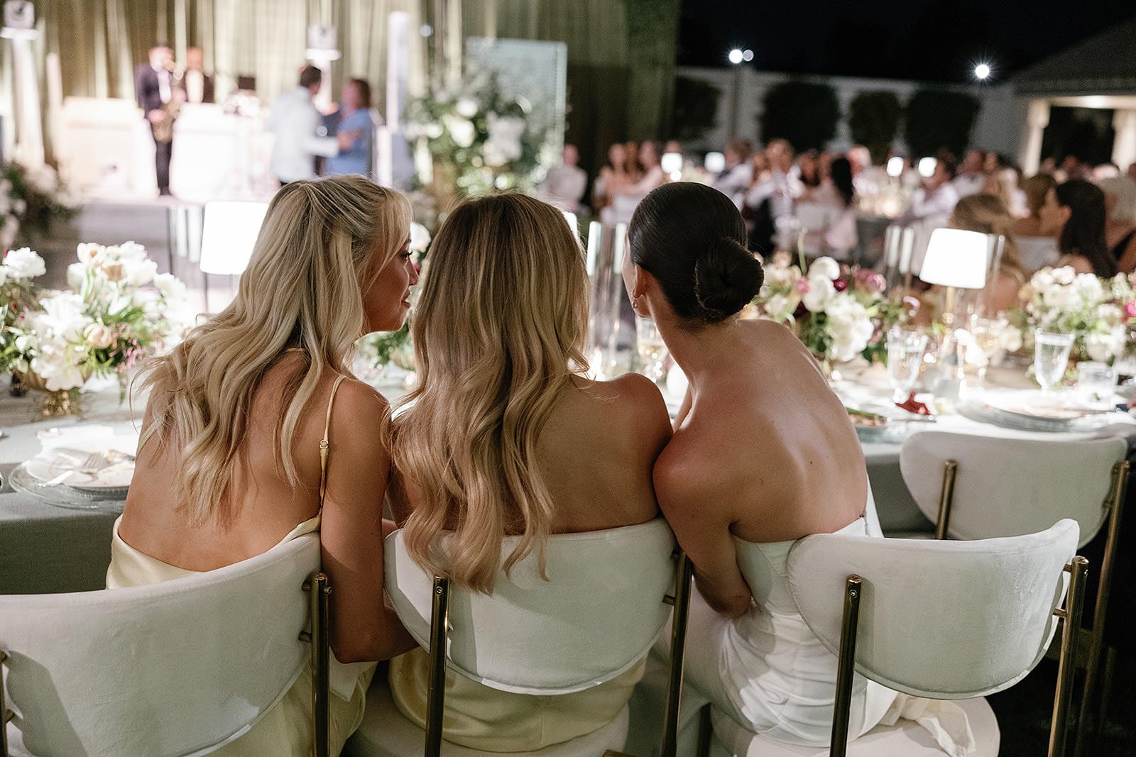 A bide and her bridsmaids at their Merv Griffin Estate wedding reception designed by COJ Events