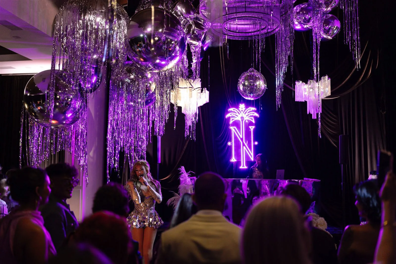 Disco balls and a drag queen performer at a Cache Estate wedding reception in Indio, CA, by Palm Springs wedding planner COJ Events