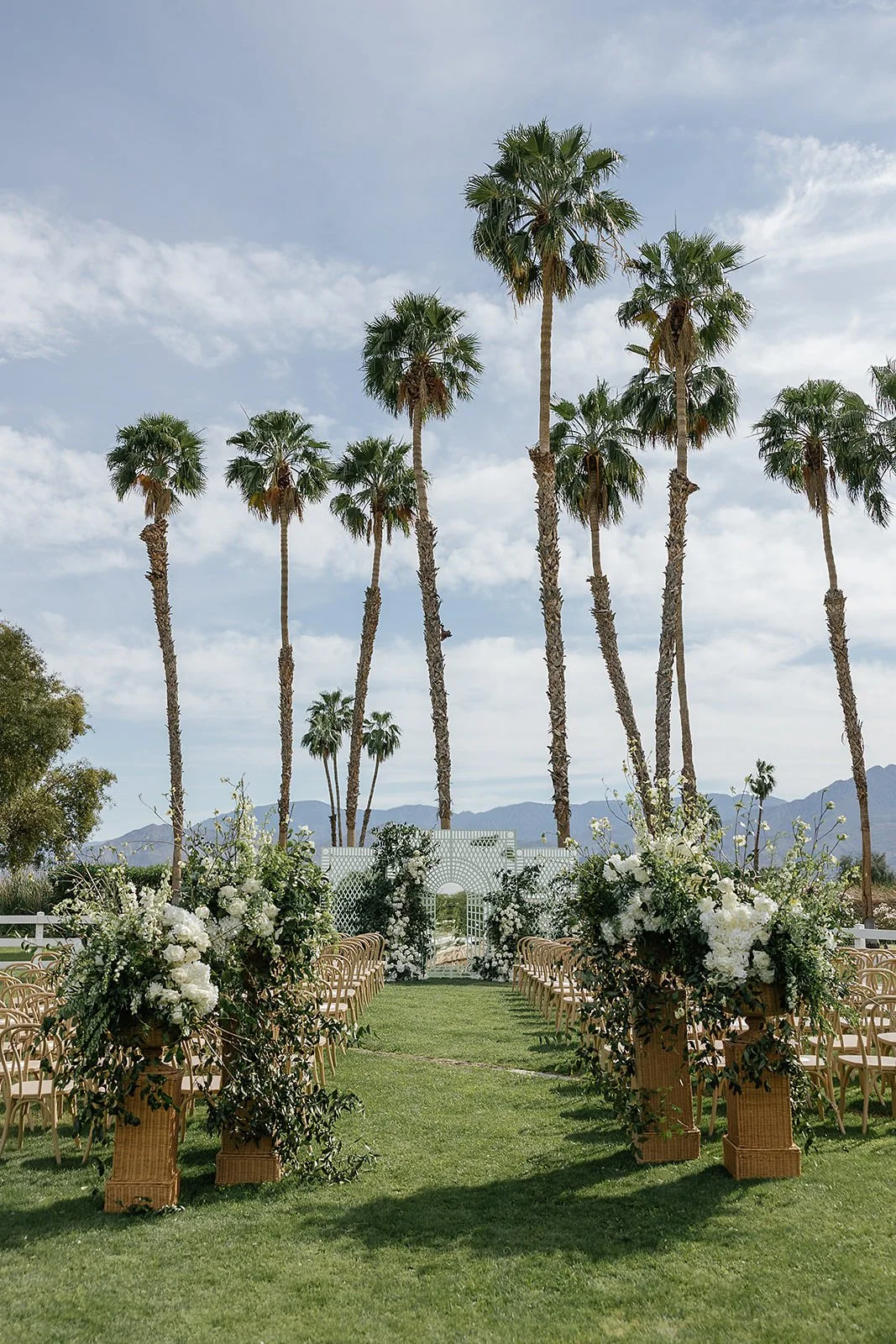 Merv Griffin Estate wedding ceremony decor with outdoor green garden party decor designed by COJ Events