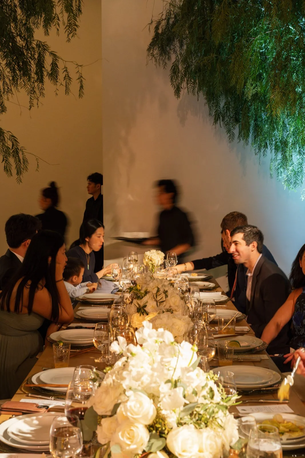Guests eating at family style Chinese dinner wedding reception at Cache Estate in Indio, CA, by Palm Springs wedding planner COJ Events