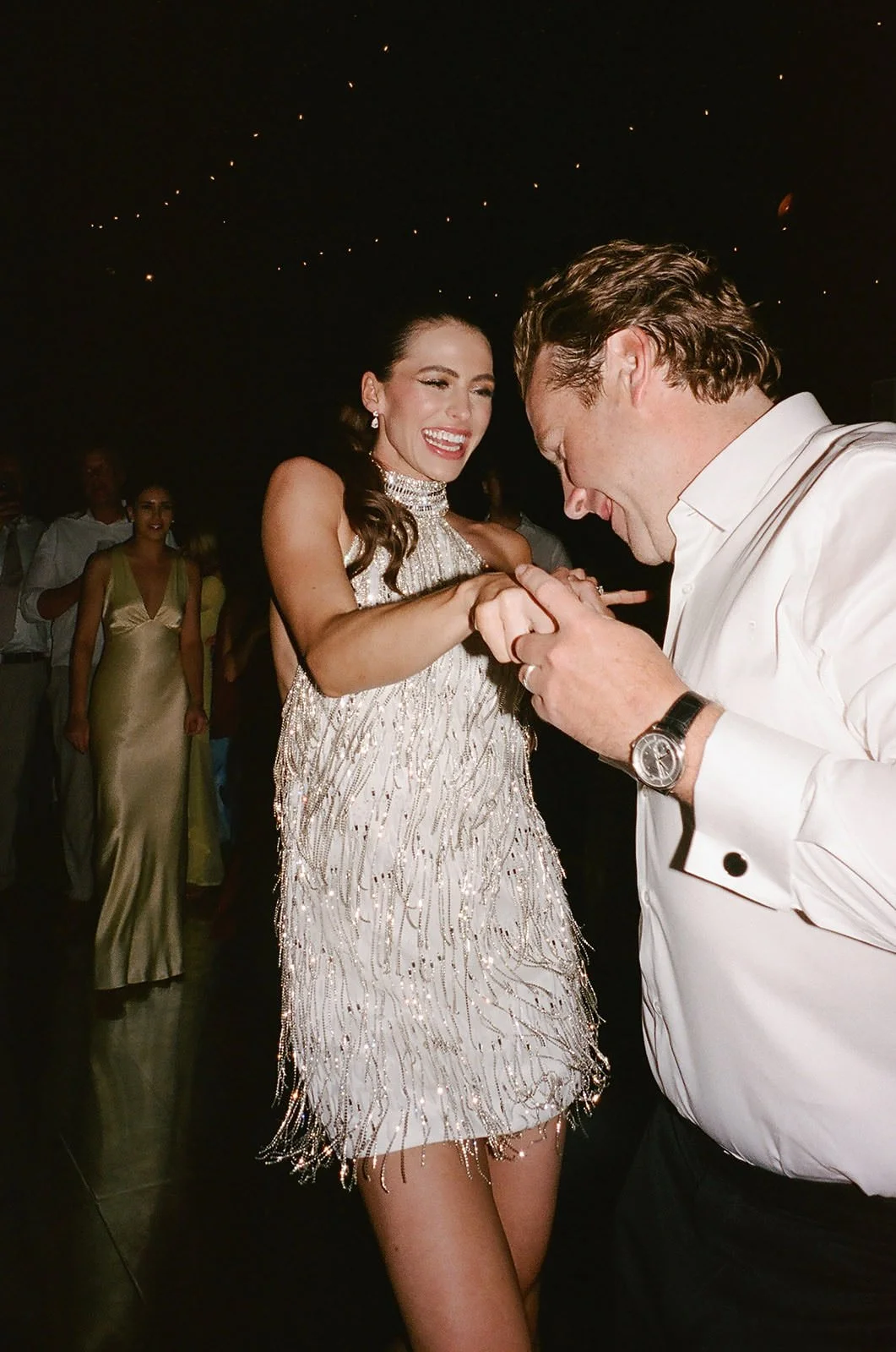 A bride and groom dancing at the late night dance party at their Merv Griffin Estate wedding, designed by COJ Events
