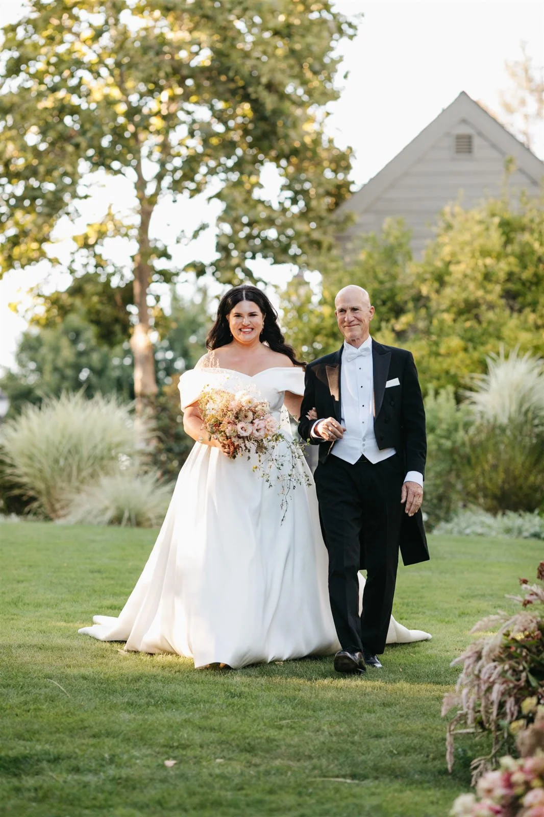Bride's father walking her down the aisle on the grounds of The Madrona -Planned by COJ Events-Palm Springs Destination Wedding