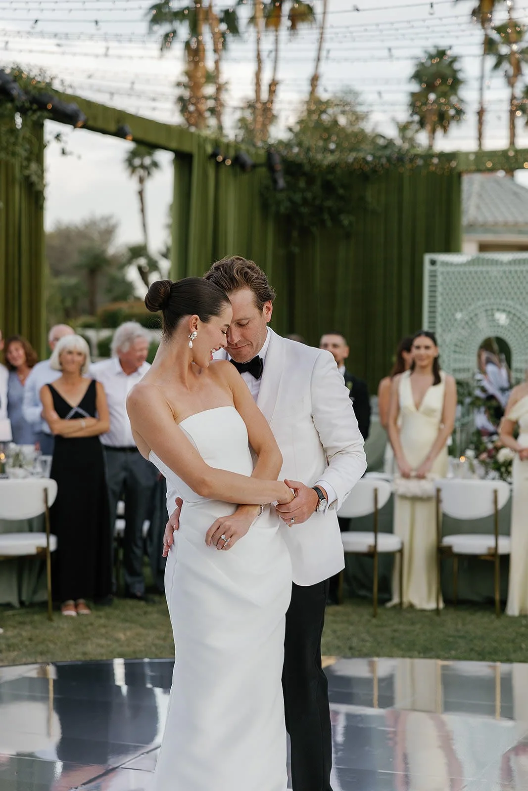 Gorgeous bride and groom 's first dance at their Merv Griffin Estate wedding reception designed by COJ Events