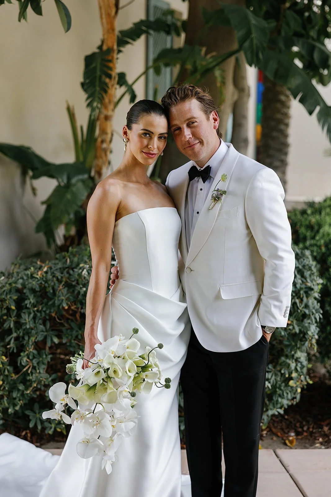 Bride and groom portrait a Merv Griffin Estate wedding with outdoor green garden party decor designed by COJ Events