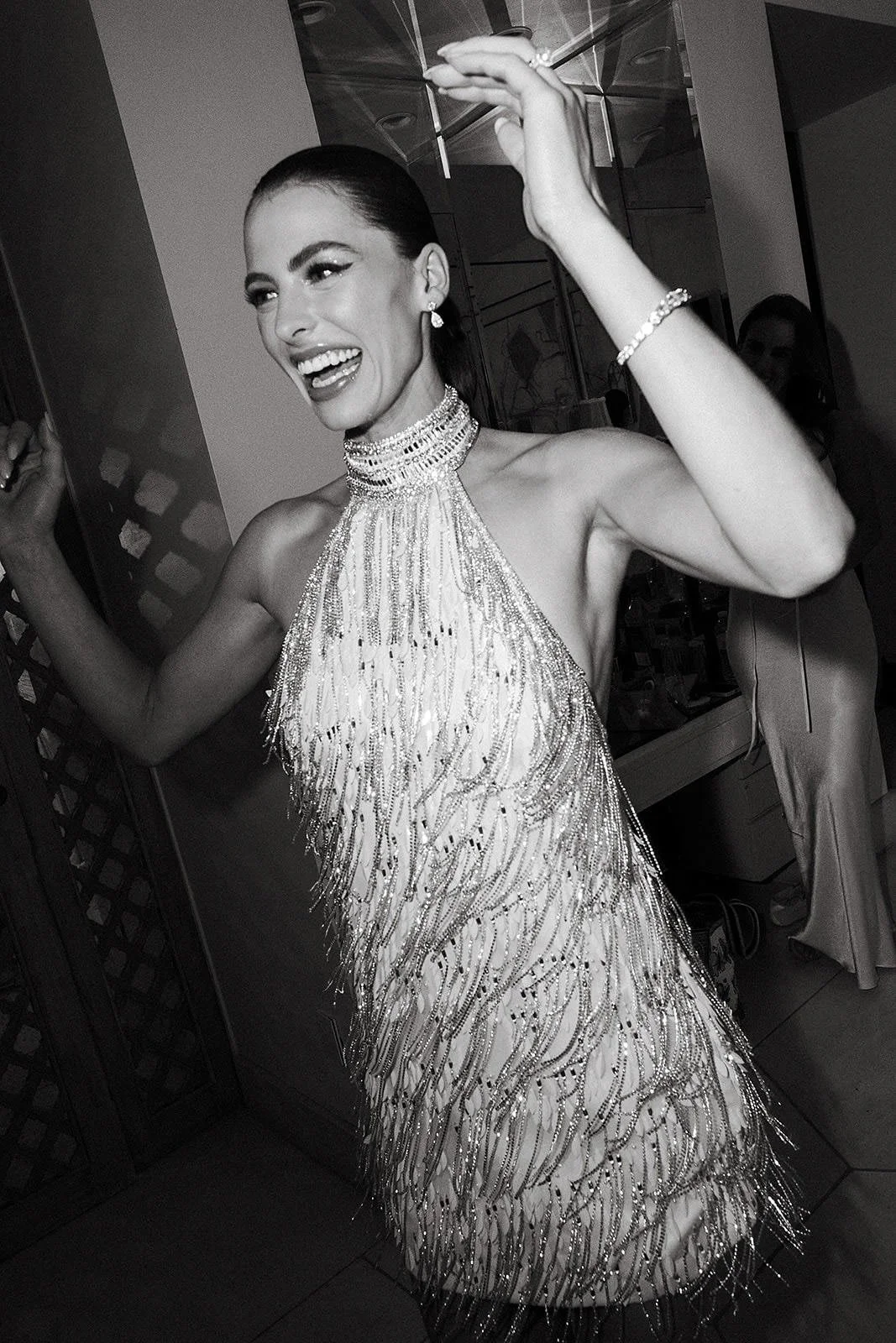 A bride in her late night dance party dress at her Merv Griffin Estate wedding reception designed by COJ Events
