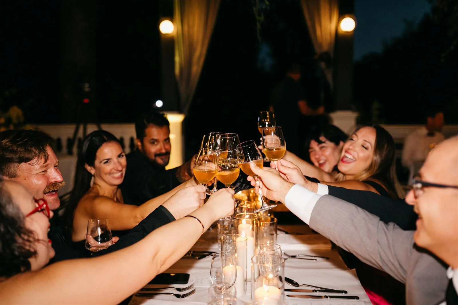 Guest's make toast to couple at the reception on the grounds of The Madrona -Planned by COJ Events-Palm Springs Destination Wedding