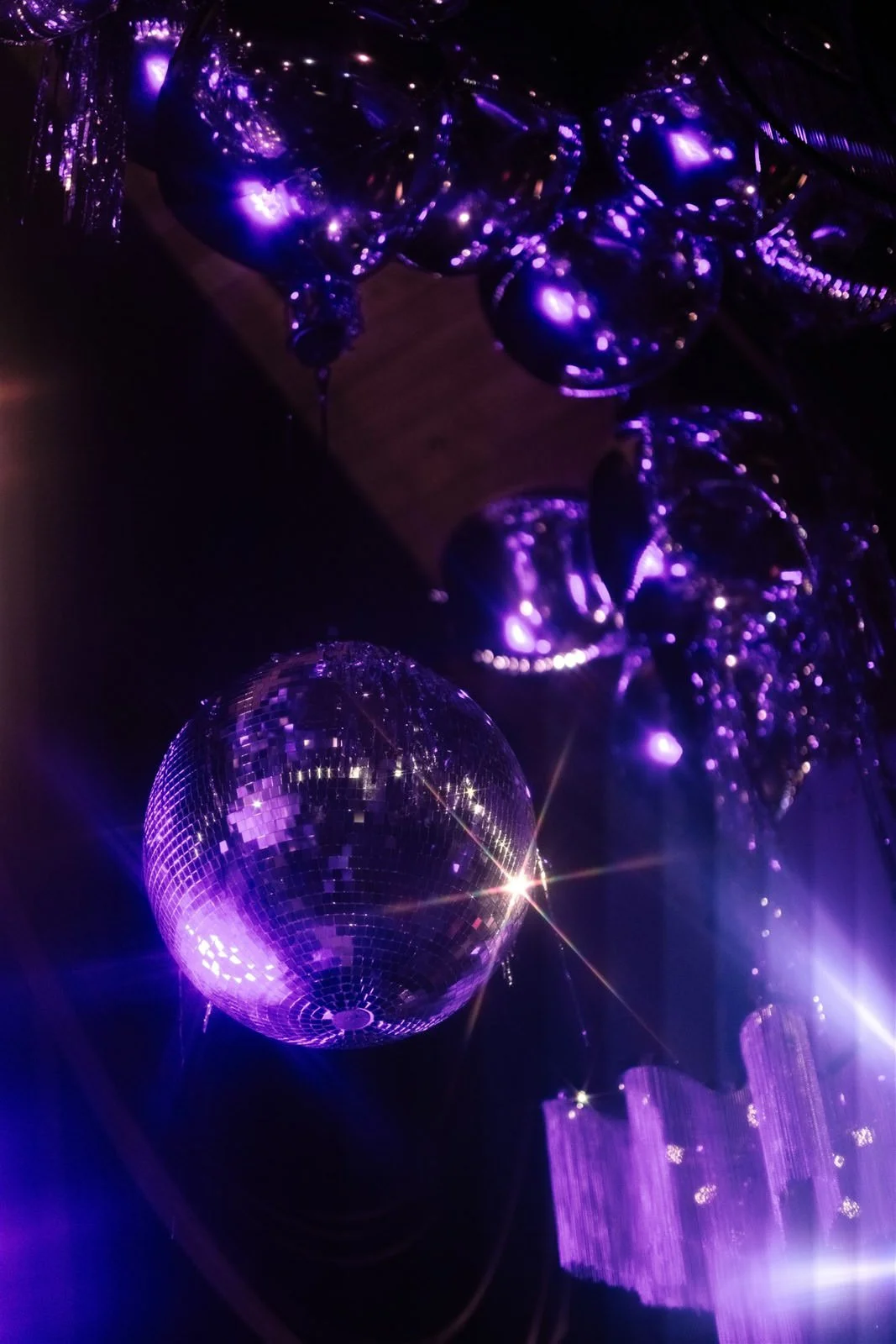 Disco balls at a Cache Estate wedding reception in Indio, CA, by Palm Springs wedding planner COJ Events