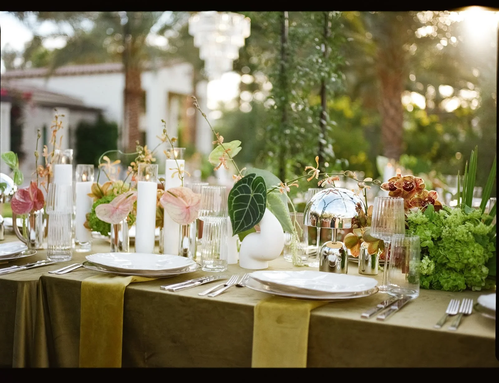 Outdoor dining table decor at a Cache Estate wedding reception in Indio, CA, by Palm Springs wedding planner COJ Events