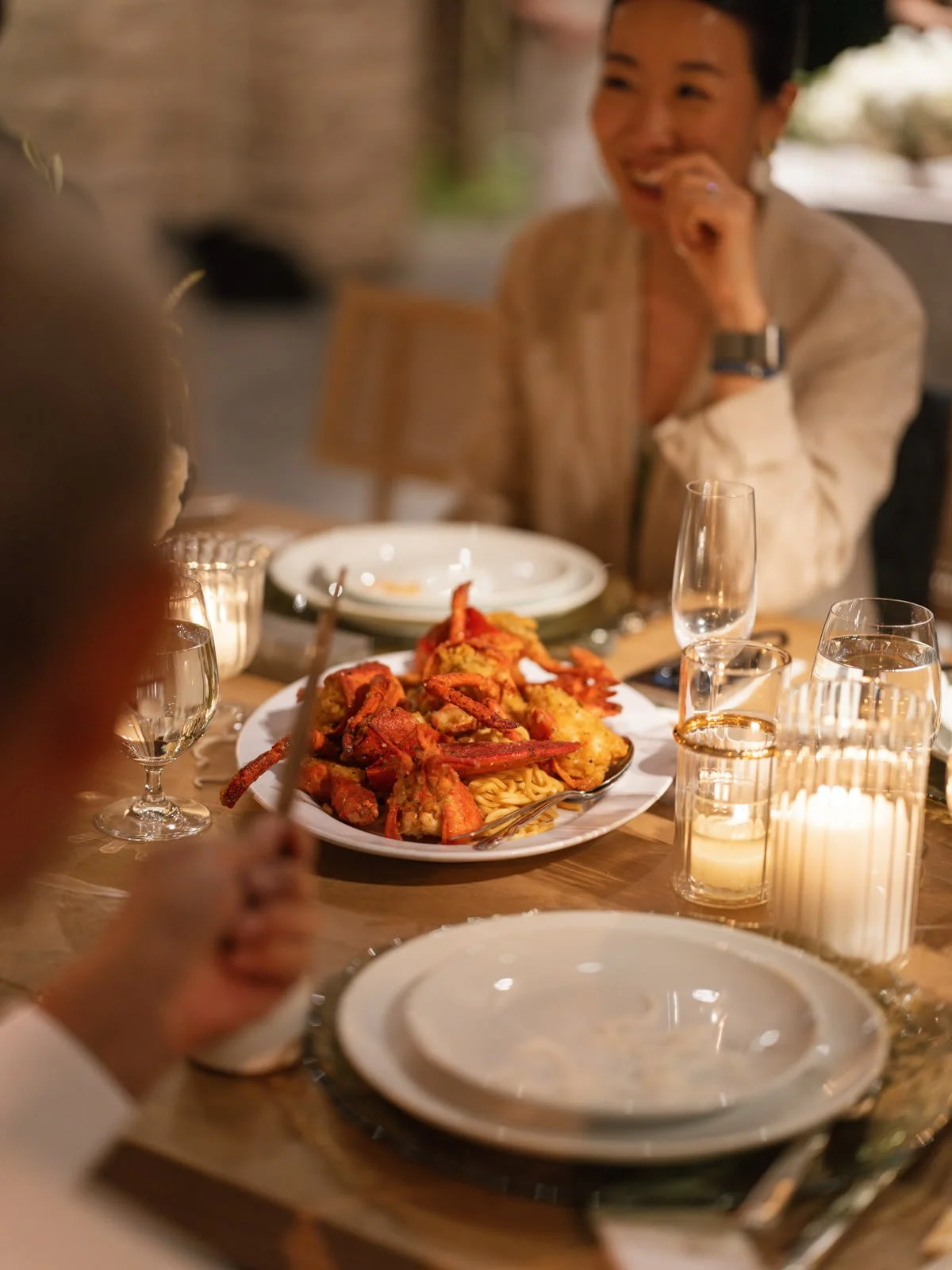 Guests eating at family style Chinese dinner wedding reception at Cache Estate in Indio, CA, by Palm Springs wedding planner COJ Events