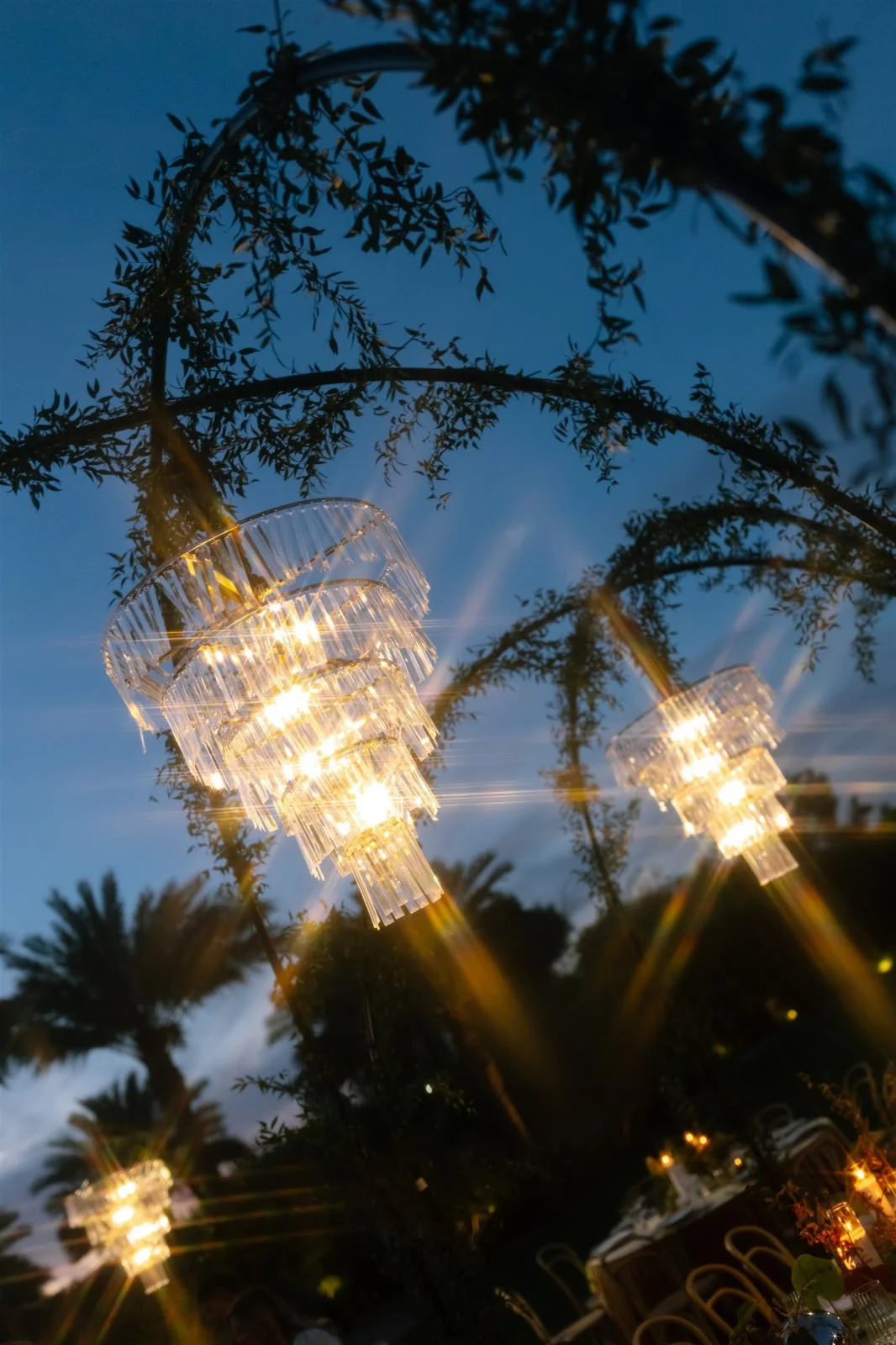 Hanging chandeliers at a Cache Estate wedding reception in Indio, CA, by Palm Springs wedding planner COJ Events