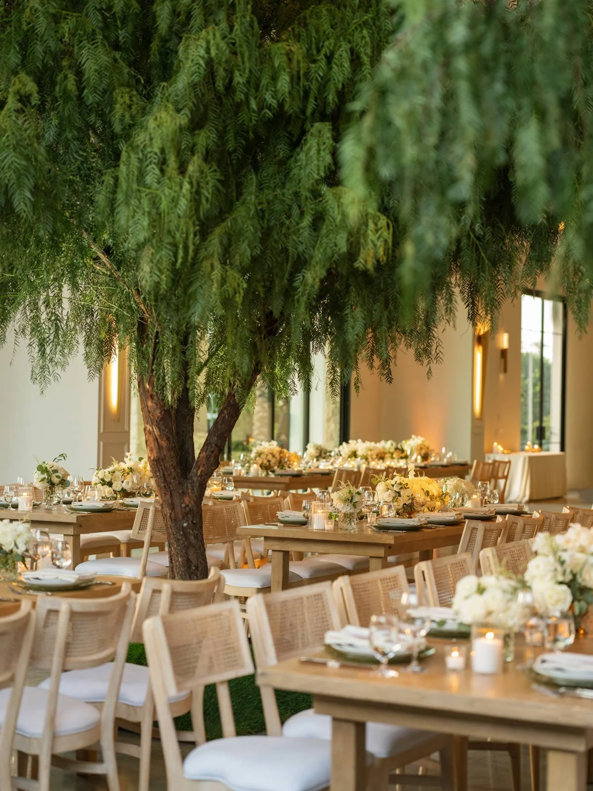 Cache Estate wedding reception decor with indoor trees in Indio, CA, by Palm Springs wedding planner COJ Events