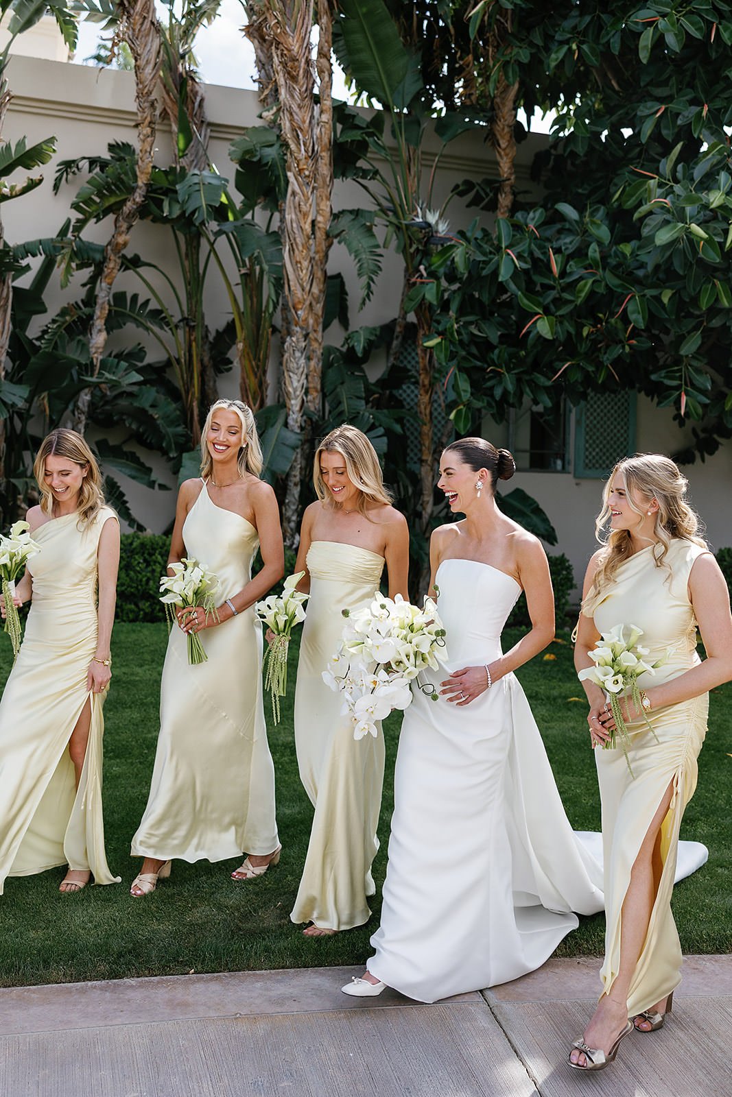 Modern Bride and her bridesmaids in yellow dresses a Merv Griffin Estate wedding designed by COJ Events