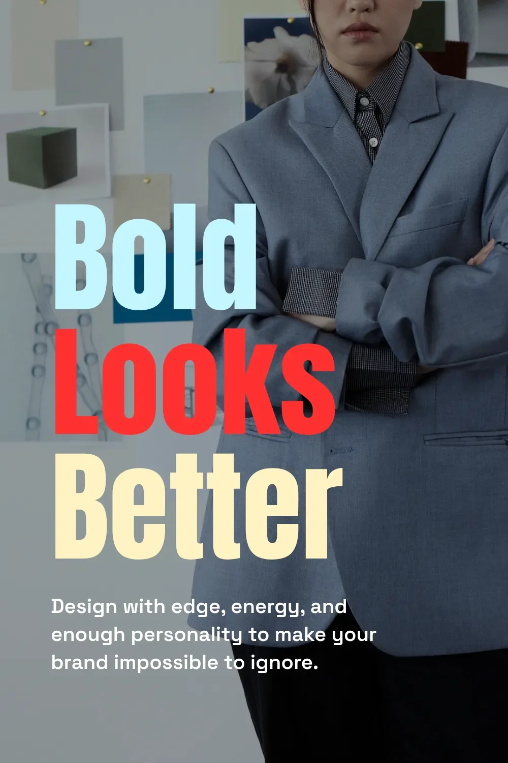 Bold Google font pairing of Anton and Space Grotesk in blue, red and cream over a woman in a grey blazer