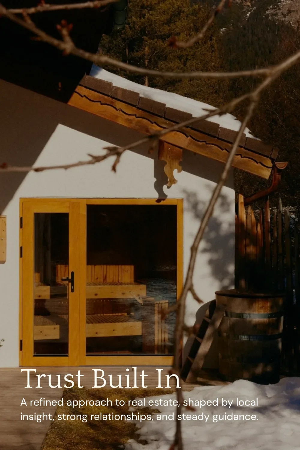 Quattrocento and DM Sans real estate font pairing over a wooden sauna cabin in winter snow