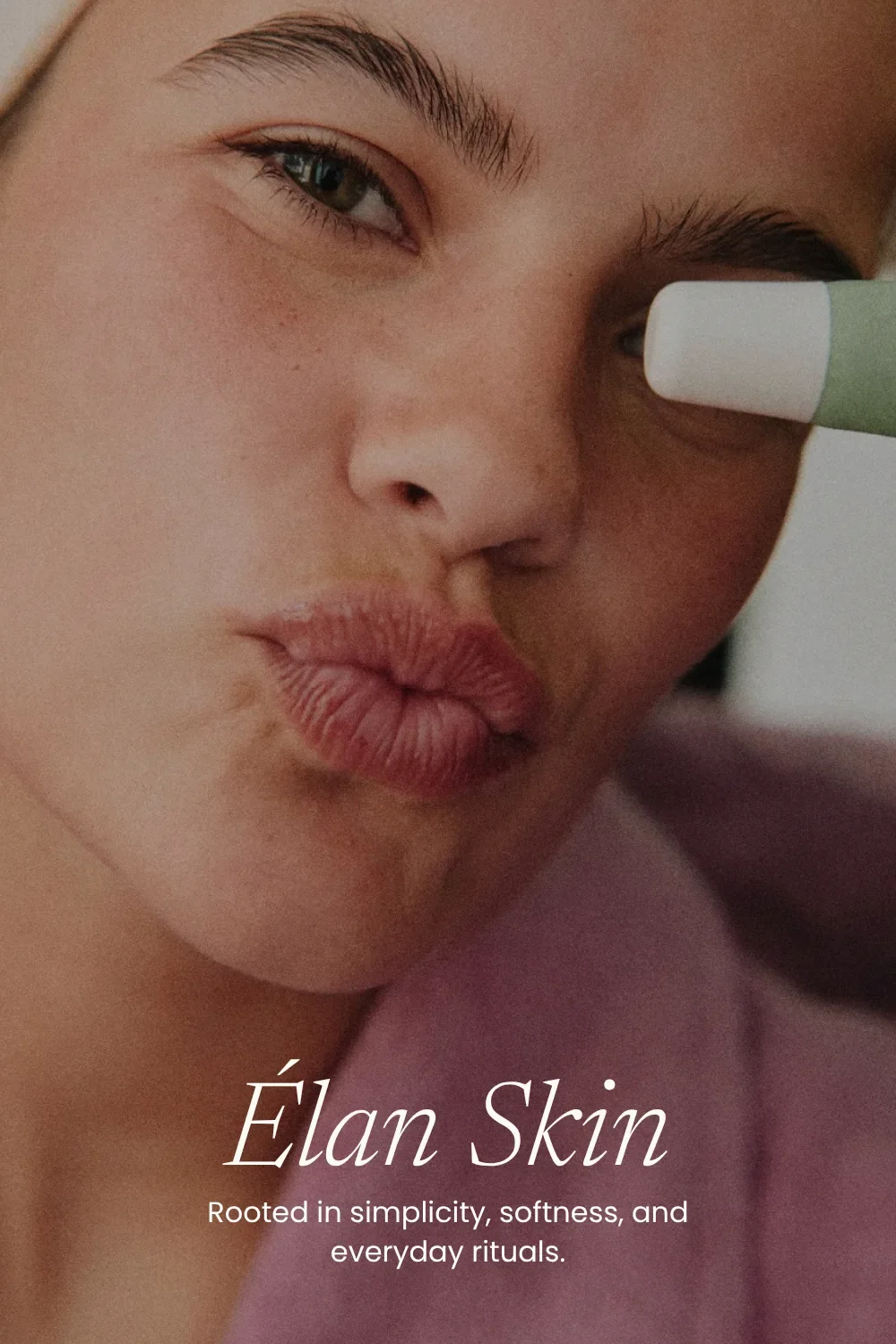 Airy Newsreader italic heading and Poppins text over a close-up of a woman holding lip balm