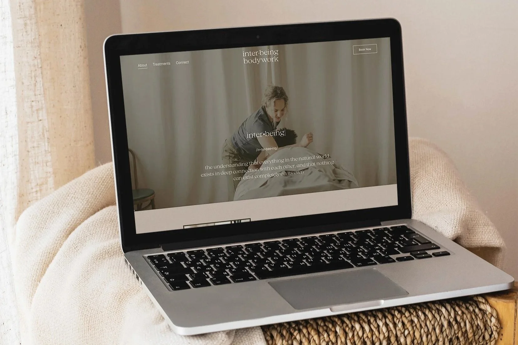 laptop mockup of interbeing bodywork website