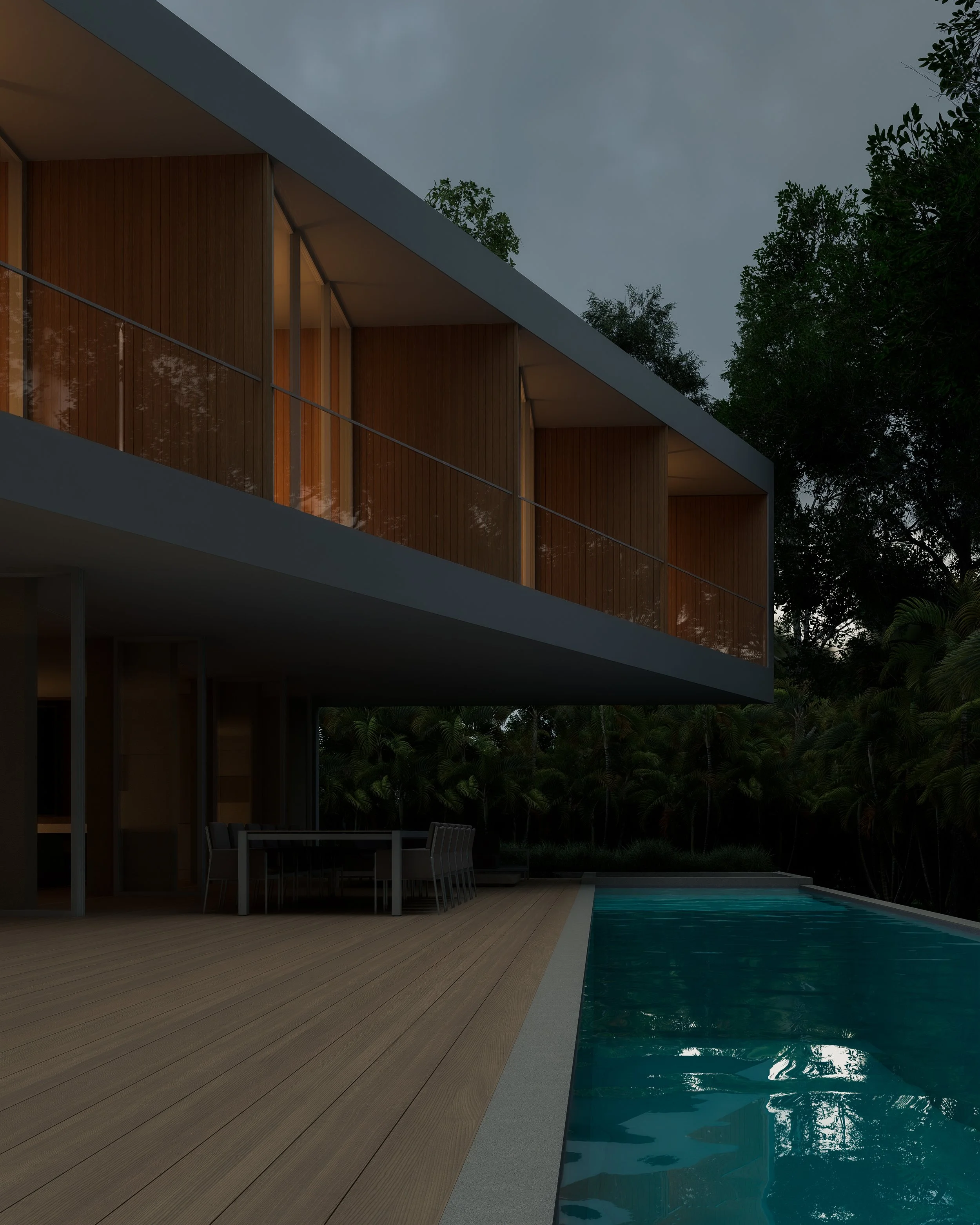 Modern house with wooden and glass exterior, outdoor dining area, and swimming pool, surrounded by trees at dusk.