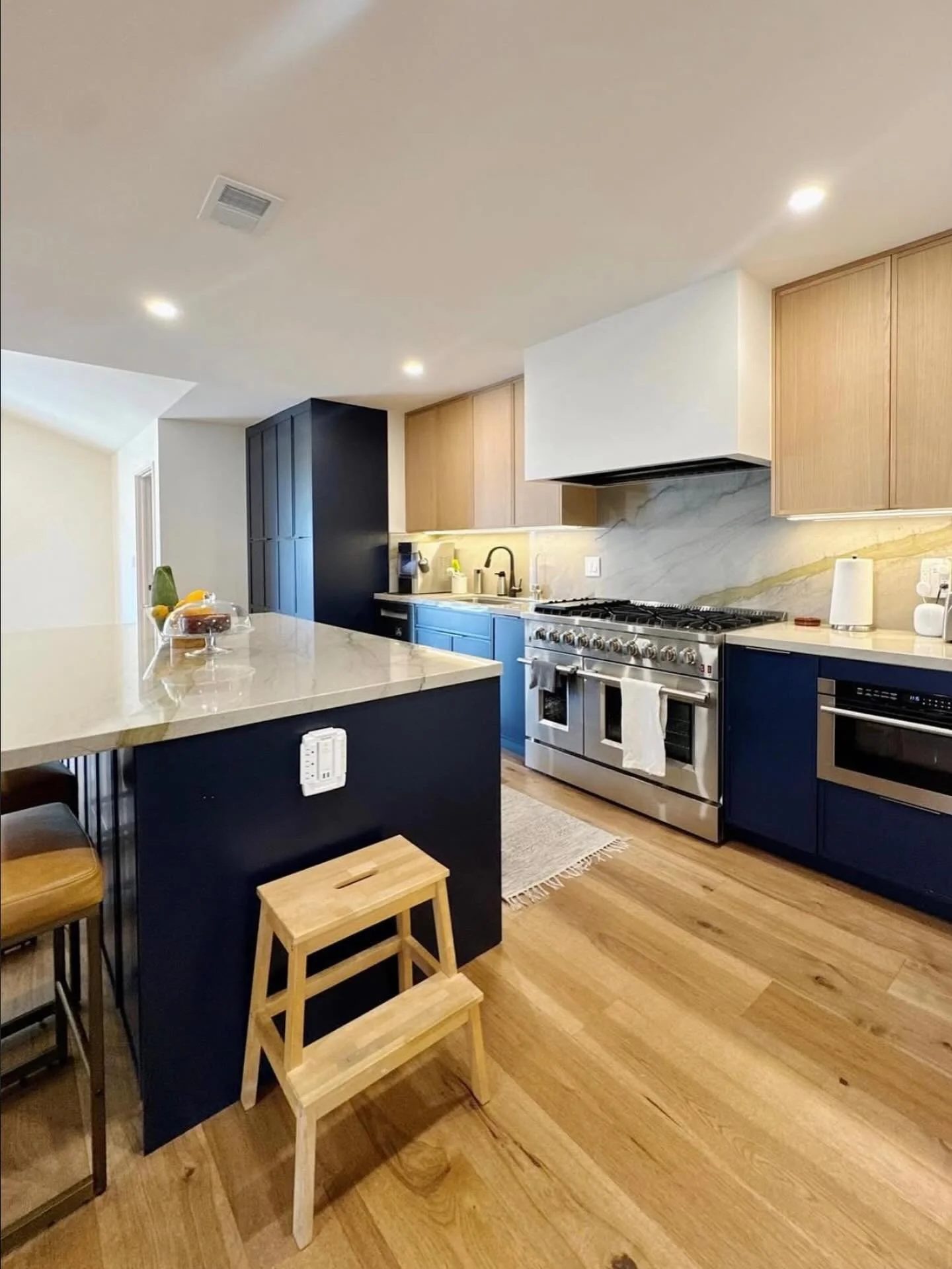 While our current project is undergoing rough electric, plumbing, and HVAC, here is a completed project from back in May 2025 &mdash; we removed a wall, opened up the kitchen, and installed an island at the center so the space could feel wider, brigh