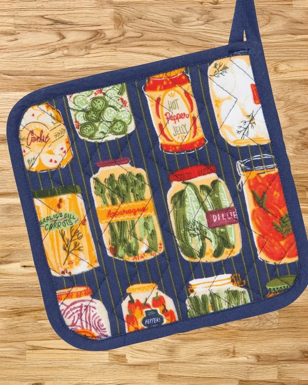 In a bit of a pickle? π₯β 
Grab this quilted potholder and handle it with style. Made from 100% cotton with a cushy polyester fill, it’s as practical as it is cute... ready to rescue hot dishes, fresh bakes, or your next canning project. Machine