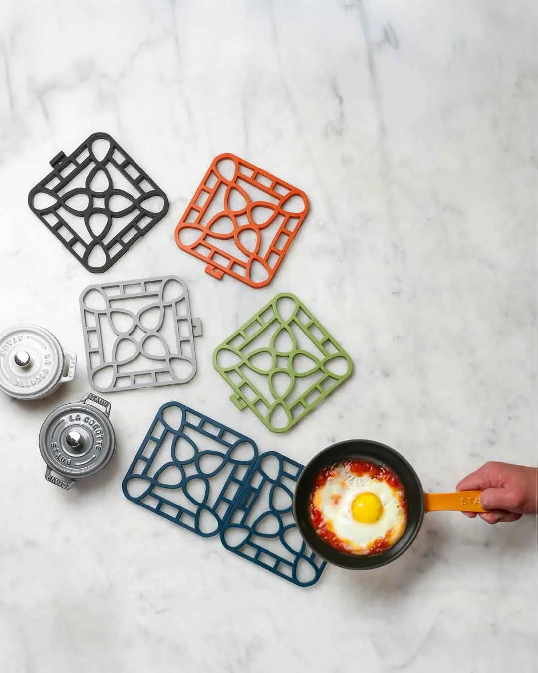 Small squares. Big magic. Our December Gadget of the Month is the Capabunga interlocking silicone trivet. Use one for everyday cooking or clip a few together for holiday casseroles and serving dishes.