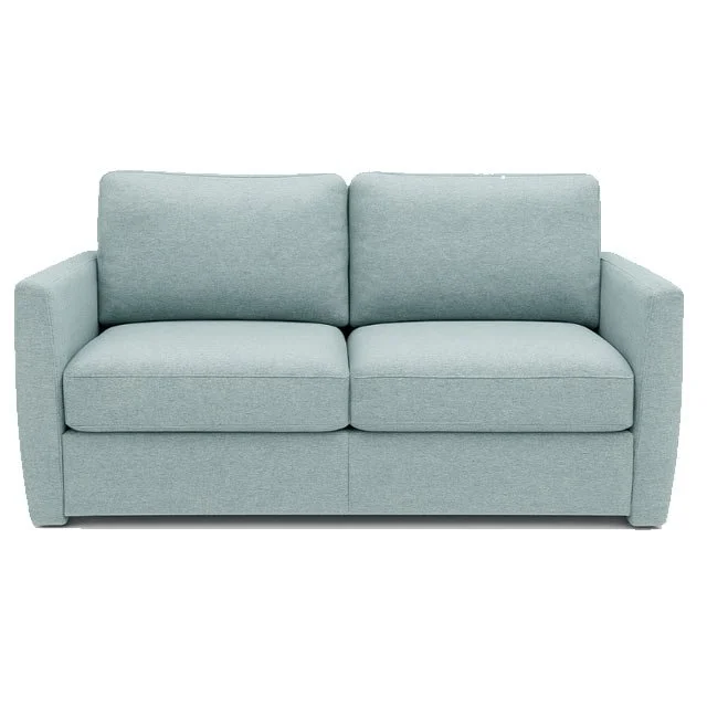 Light gray sectional sofa with three cushions and chaise lounge on the left side.