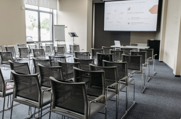 Corporate training room prepared for executive AI strategy workshop.