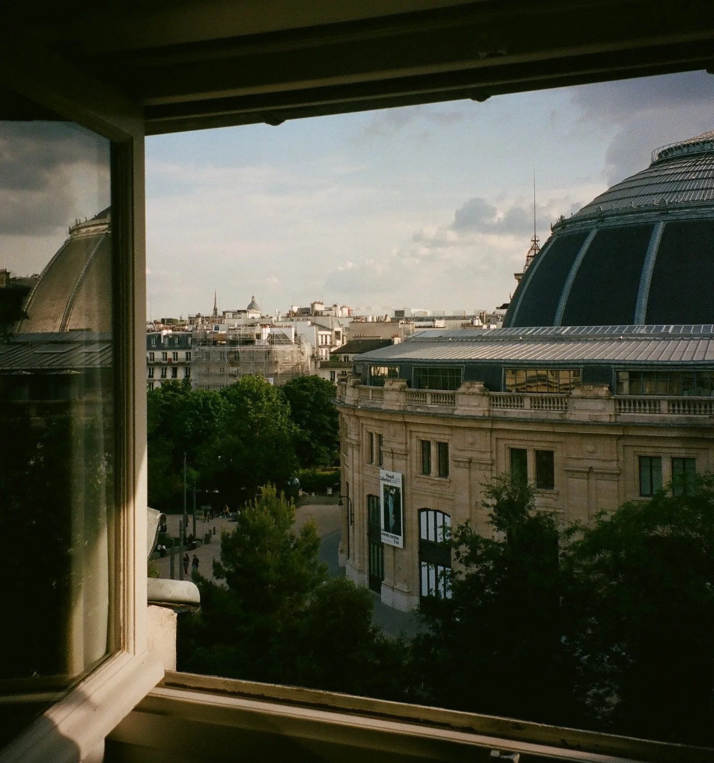 Obsessed with the reflection of the building in the window