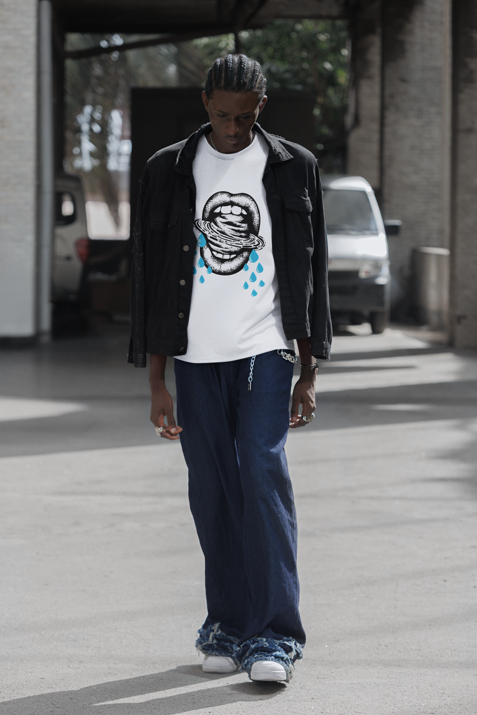 round-neck-tee-mockup-of-a-man-walking-in-the-street-with-a-serious-look-m55885 (1).png