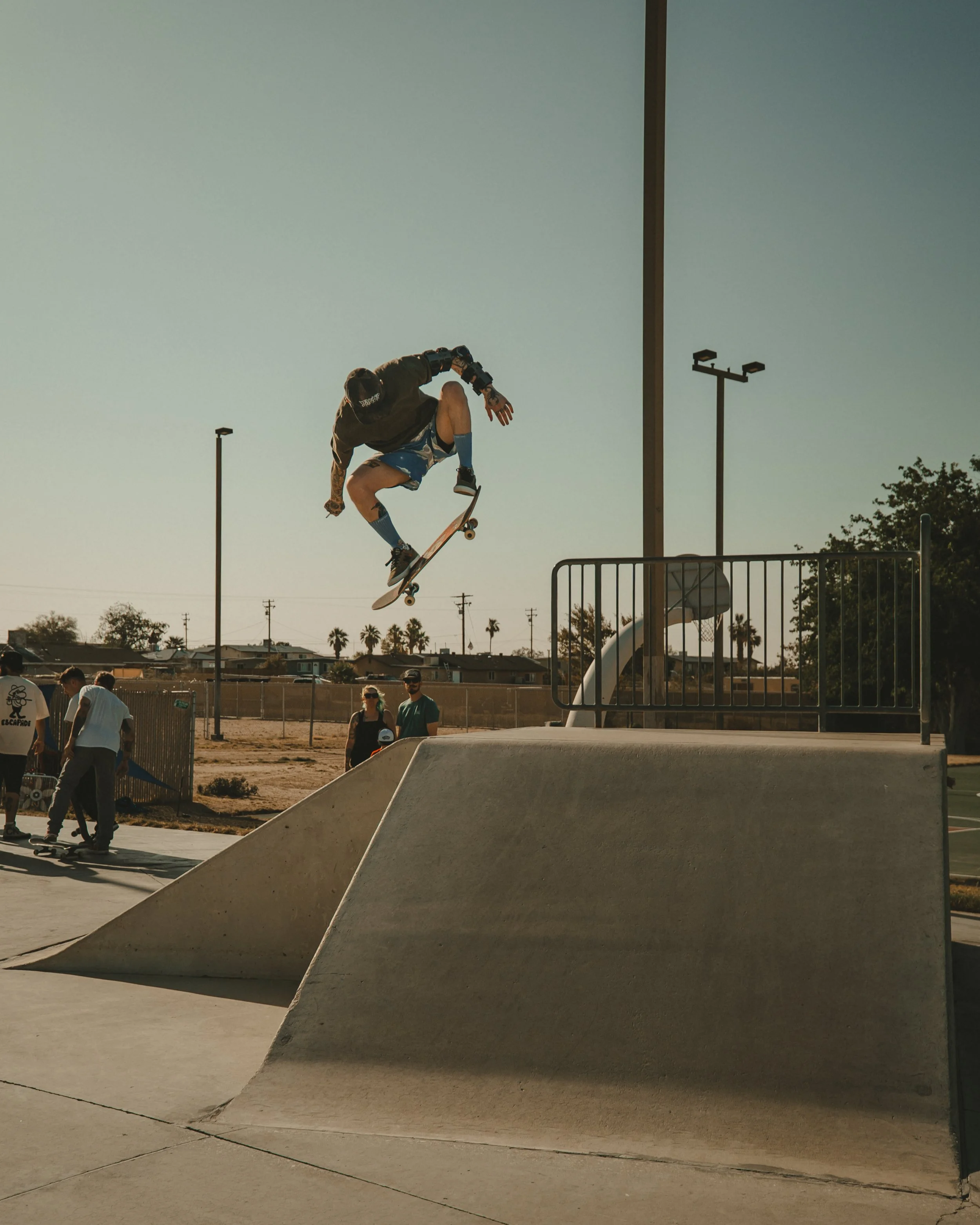 a skateboarder in the air over Luckie Park Skate Park