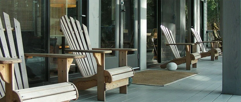 Bridge House deck has a large, private, 8-person hot tub and Adirondack chairs.