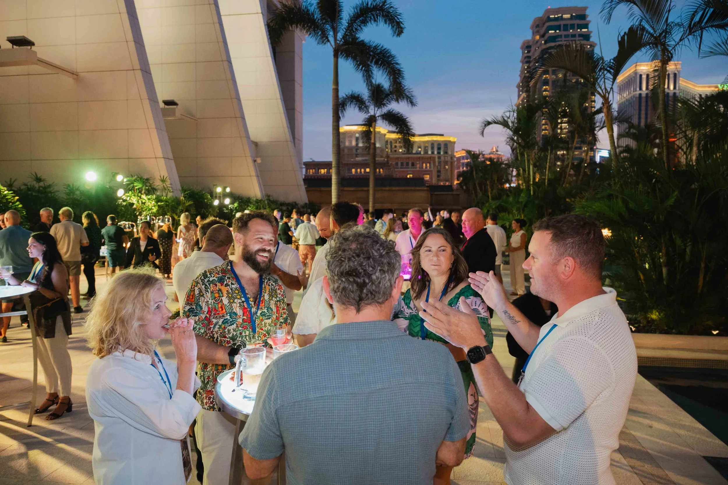Cocktail party and networking event coverage in Macau, capturing guest interaction, casual hospitality moments and resort-style evening atmosphere.