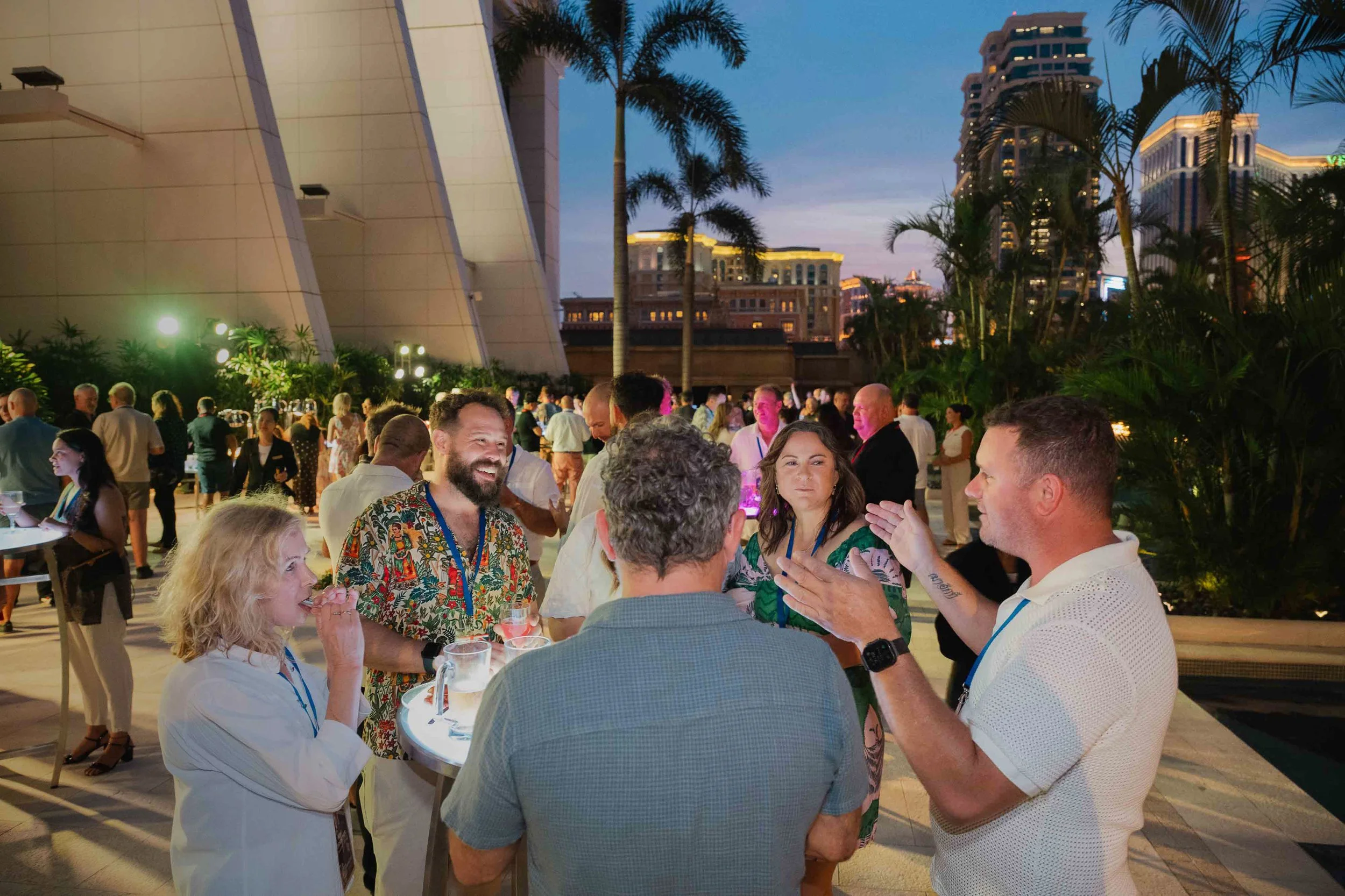 Cocktail party and networking event coverage in Macau, capturing guest interaction, casual hospitality moments and resort-style evening atmosphere.