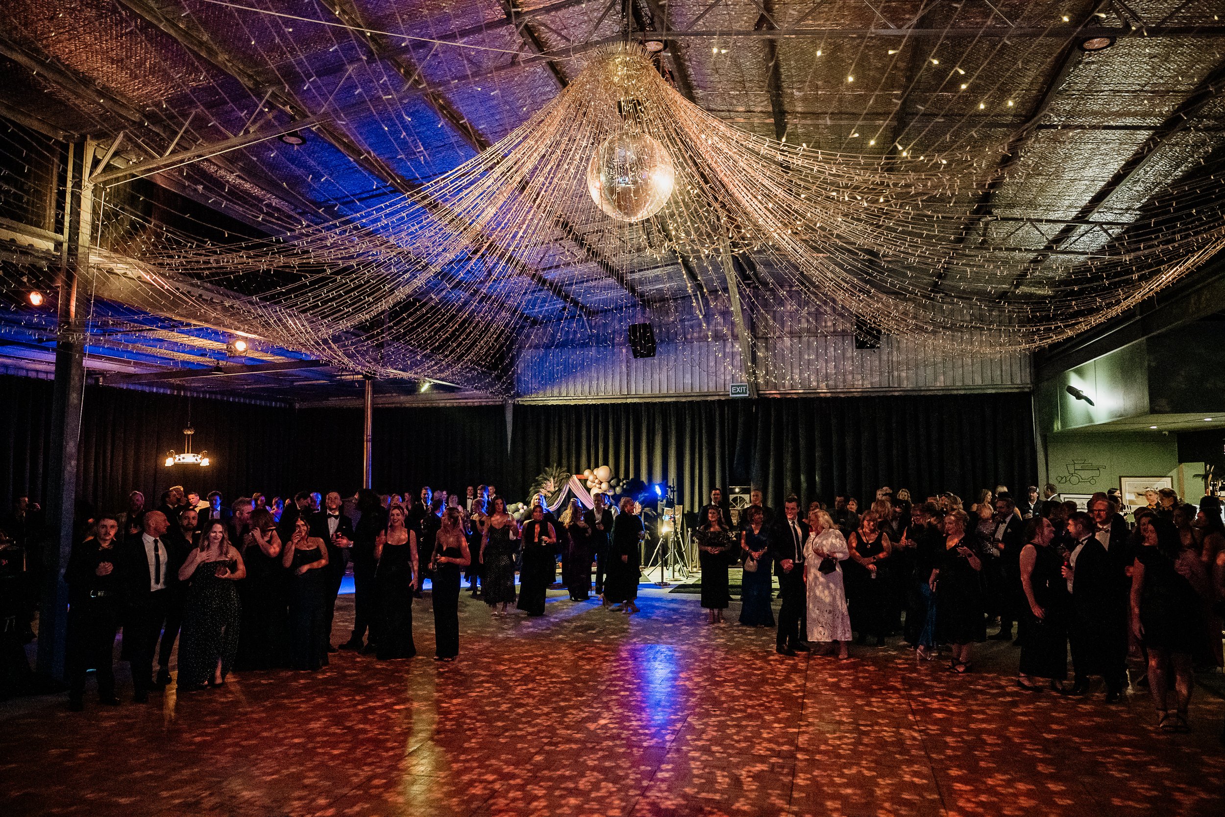 During the speeches of a local fundraiser for important causes at the Hangar Bar