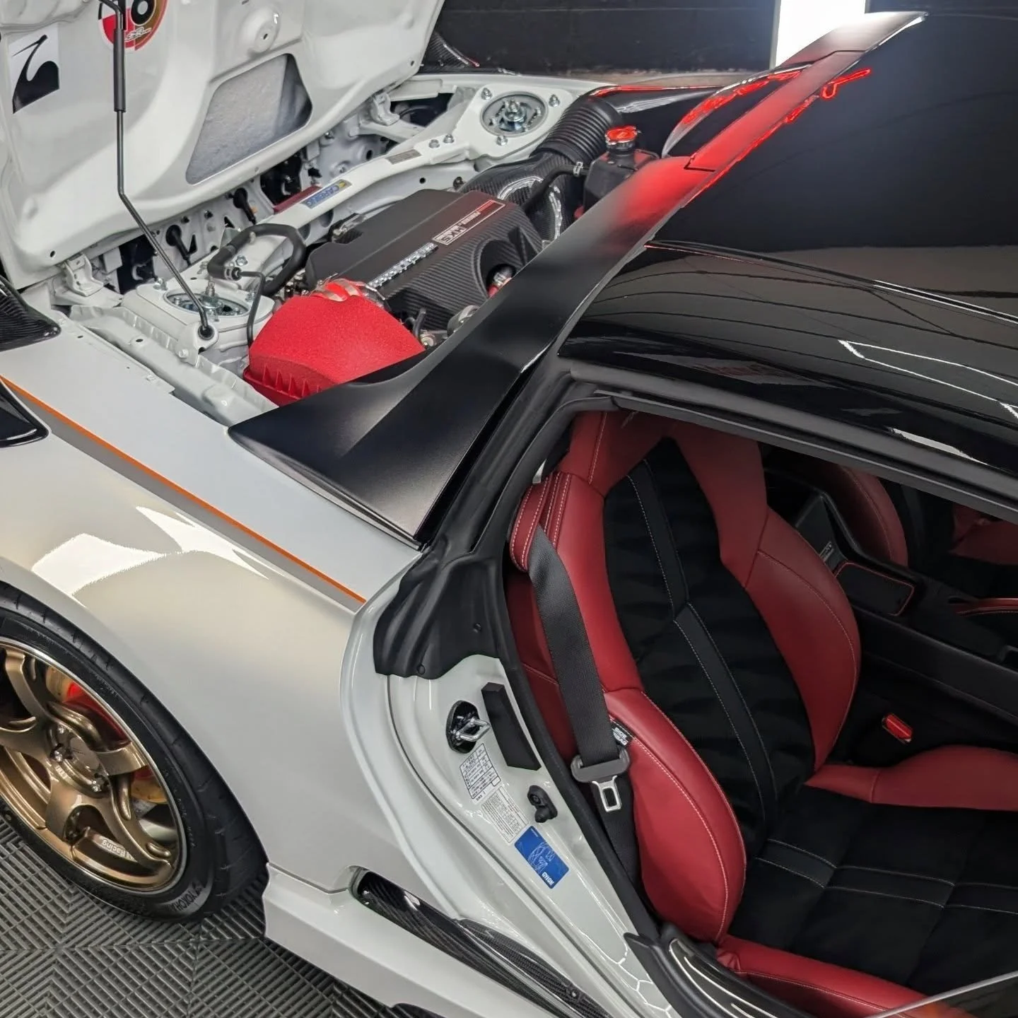 Honda S660 

This super tidy s660 came to us for the full correction &amp; coating package, opting for protective coatings head to toe, inside &amp; out, as well as installation of the vinyl pinstripes.

Now glistening the way any enthusiasts car sho