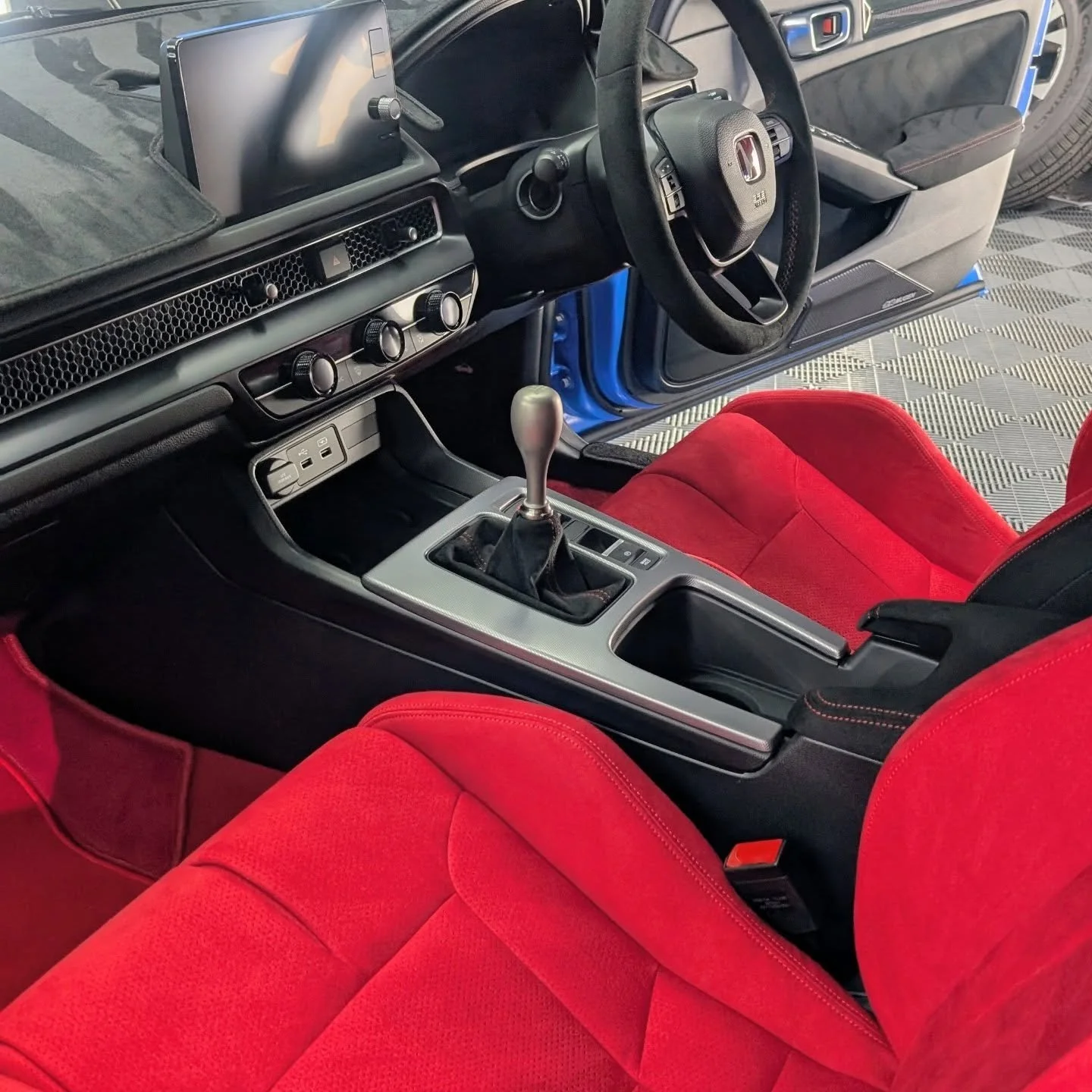 Honda Civic Type R 

In for our elite protection package, coated head to toe inside and out, as well as door cup + boot sill PPF, &amp; Type R decals applied prior to coating. 

The gloss on this blue was just next level under our showroom lights ! N