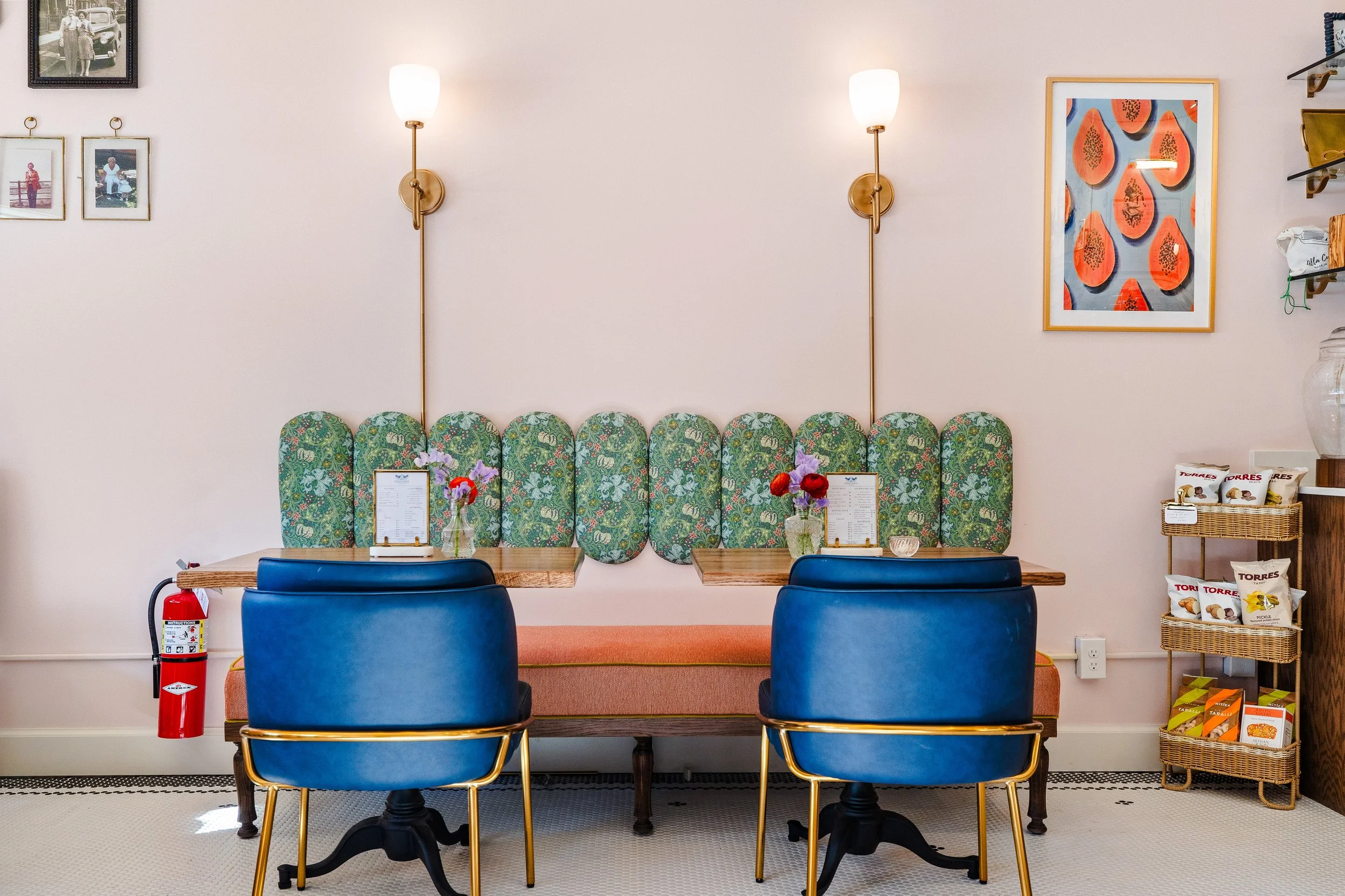 Cafe eating area with custom upholstered bench seating.