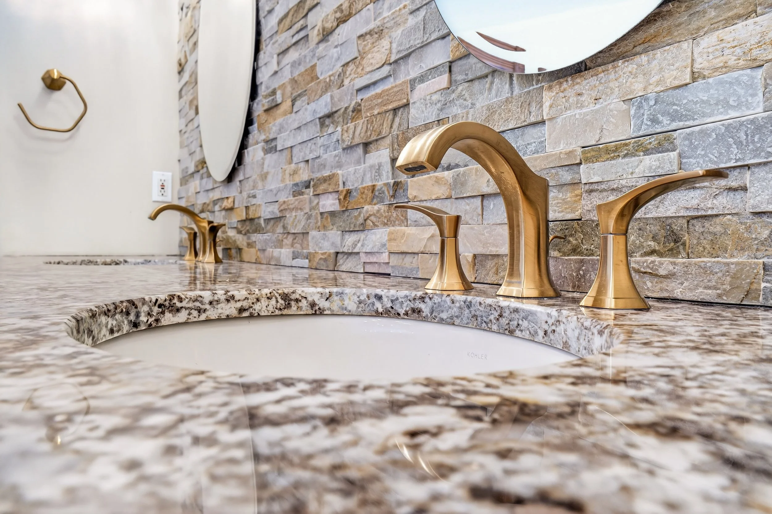 Granite countertop on a dual sink vanity.