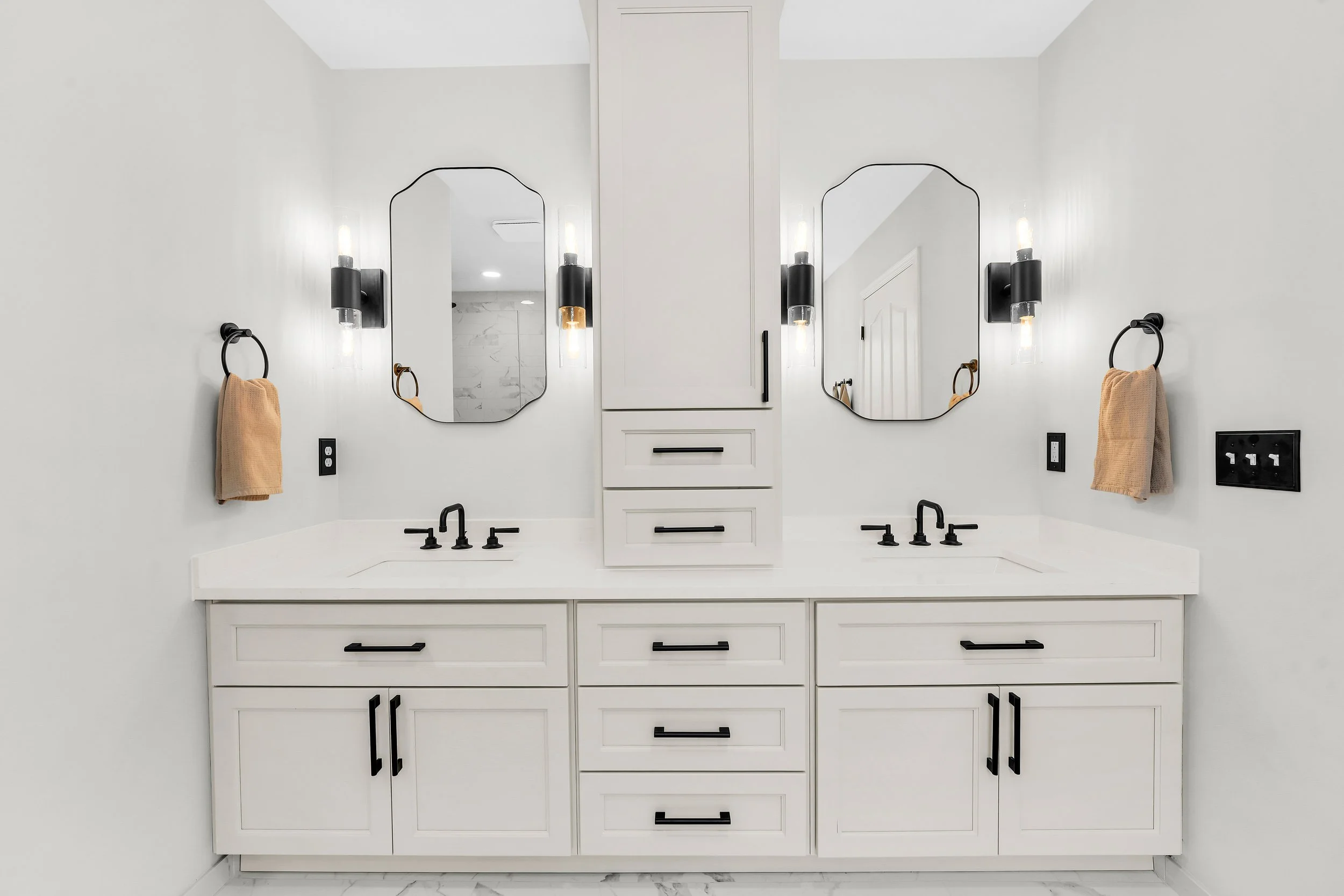 Gray double vanity with storage tower