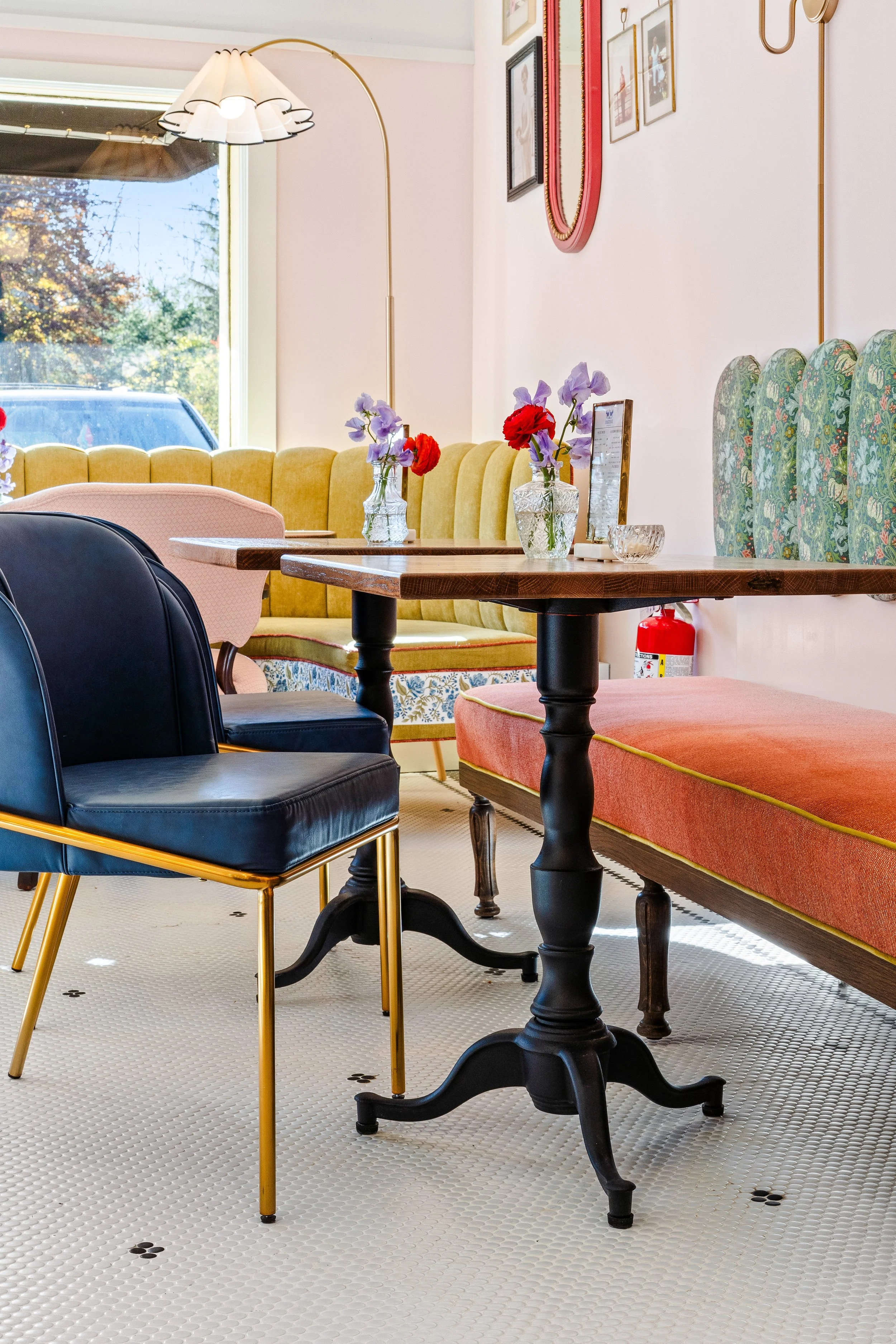Cafe eating area with custom upholstered bench seating.