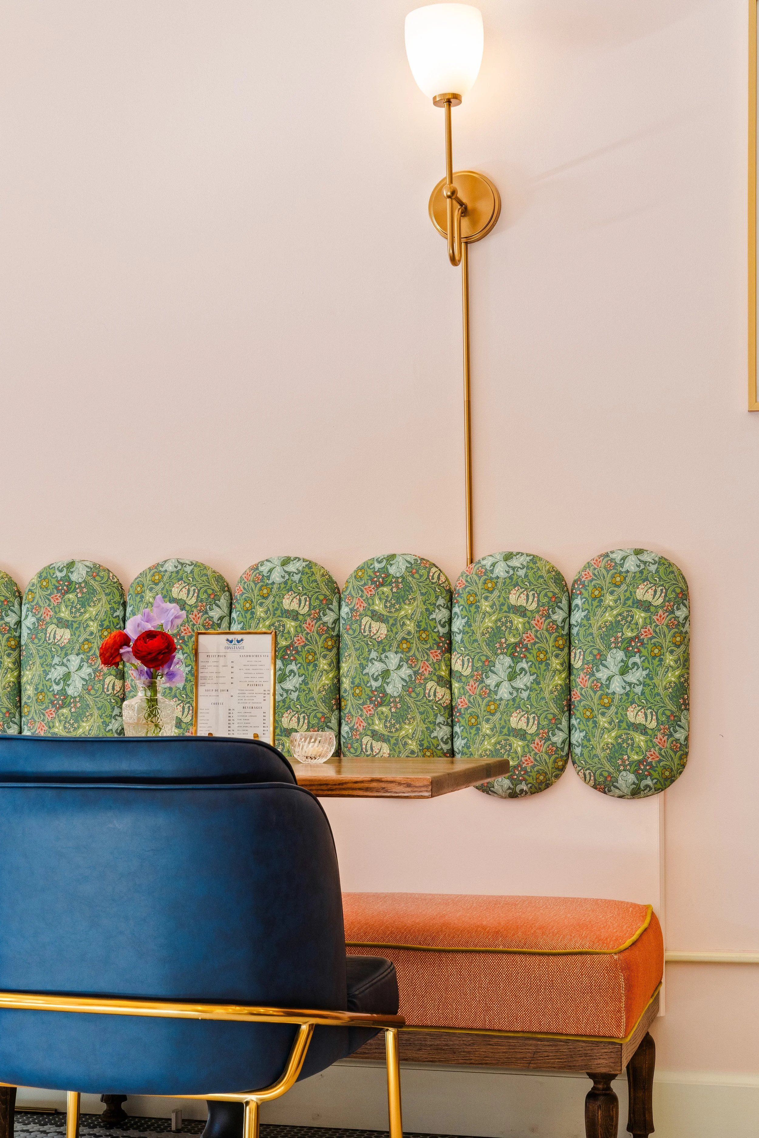 Cafe eating area with custom upholstered bench seating.
