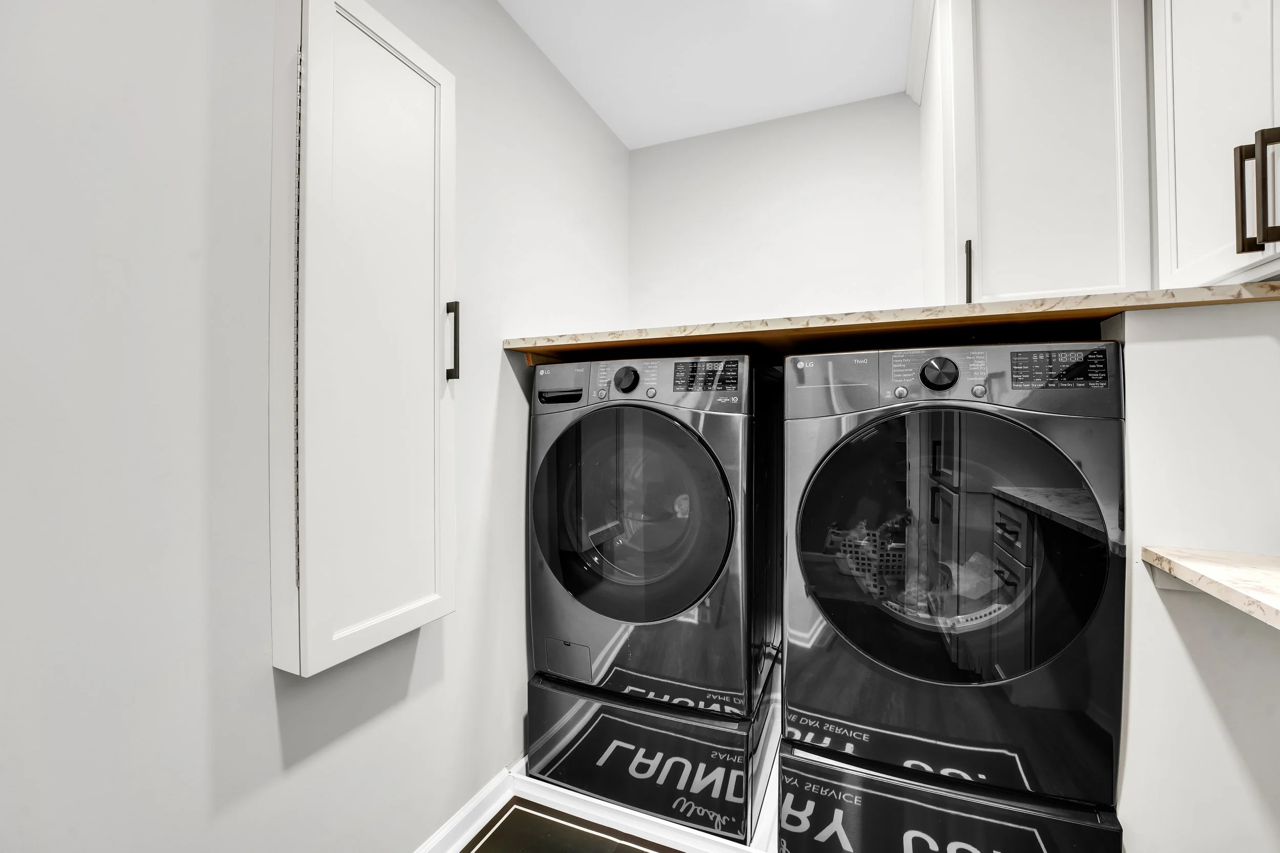 Fold out wall mounted ironing board in the closed position