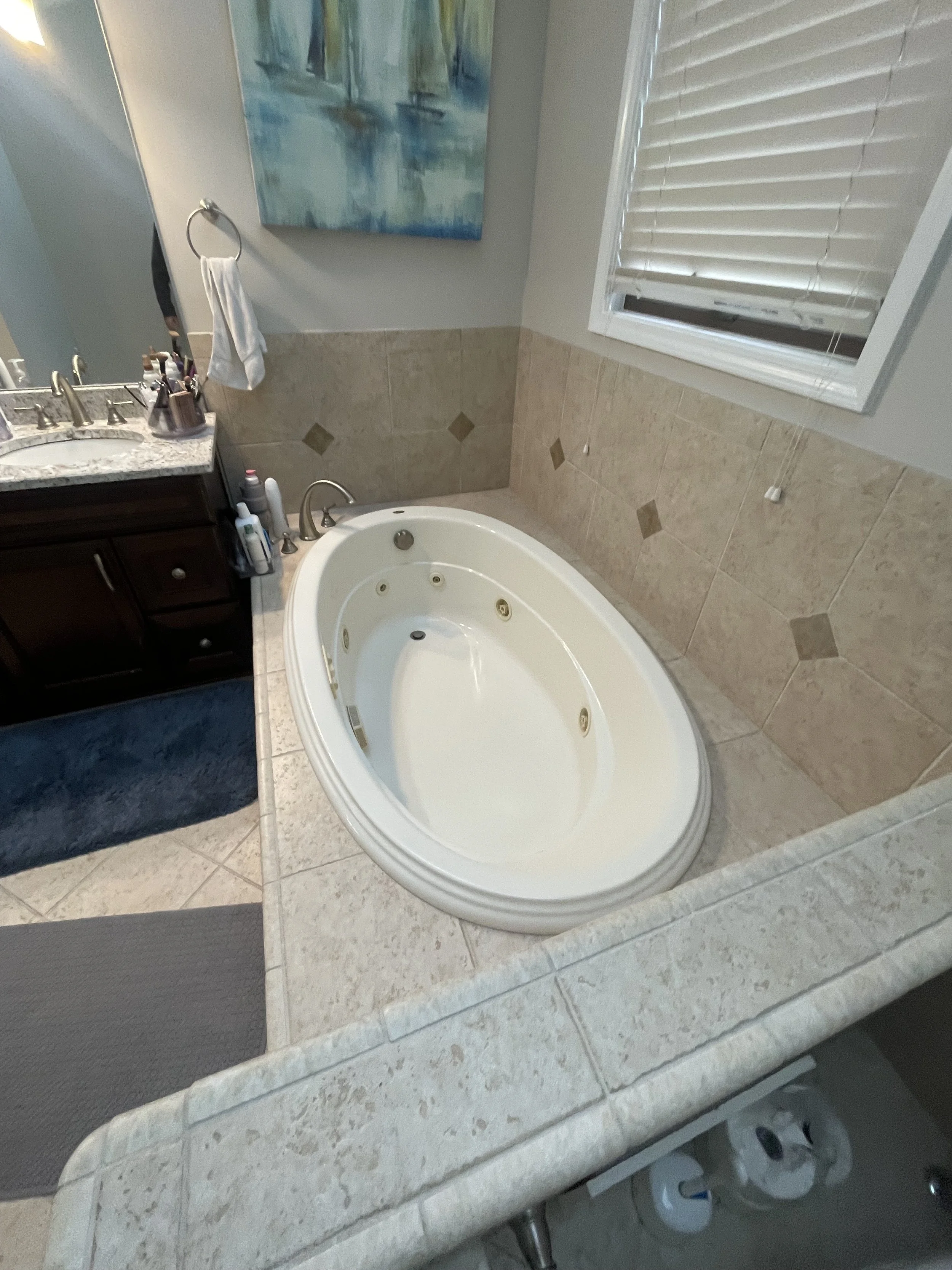 Built in jacuzzi tub before a bathroom renovation