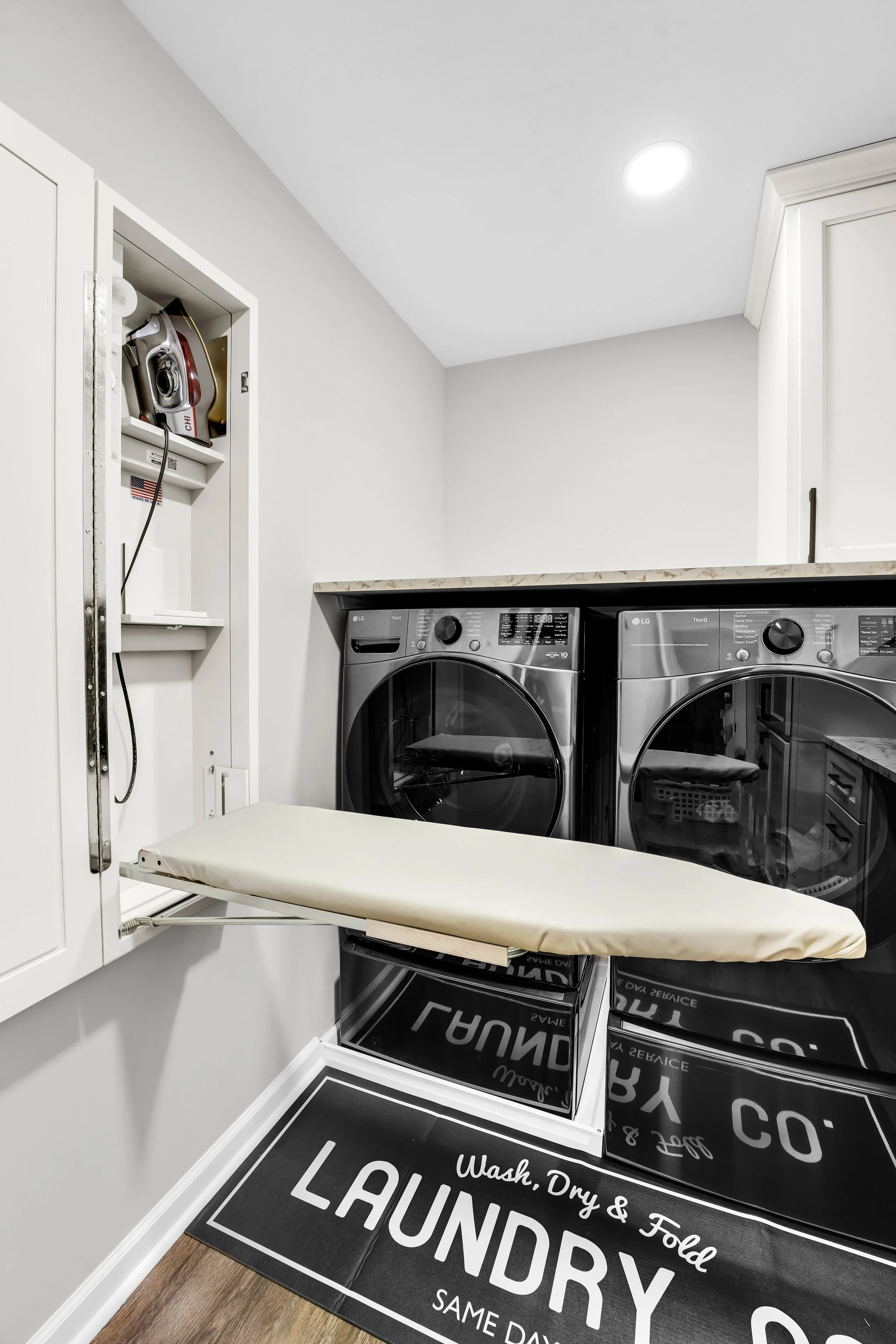Fold out wall mounted ironing board