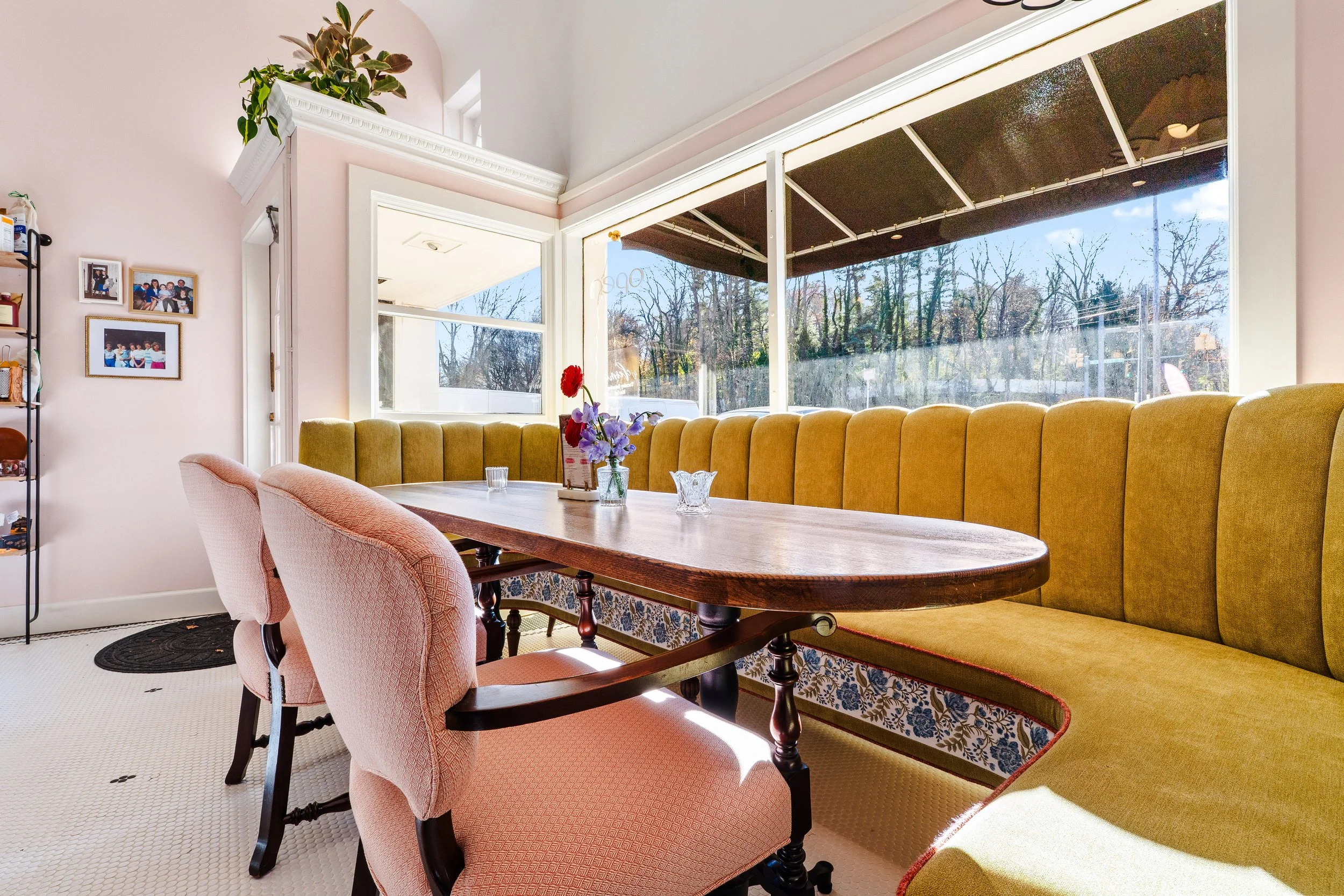 Cafe eating area with custom upholstered bench seating.