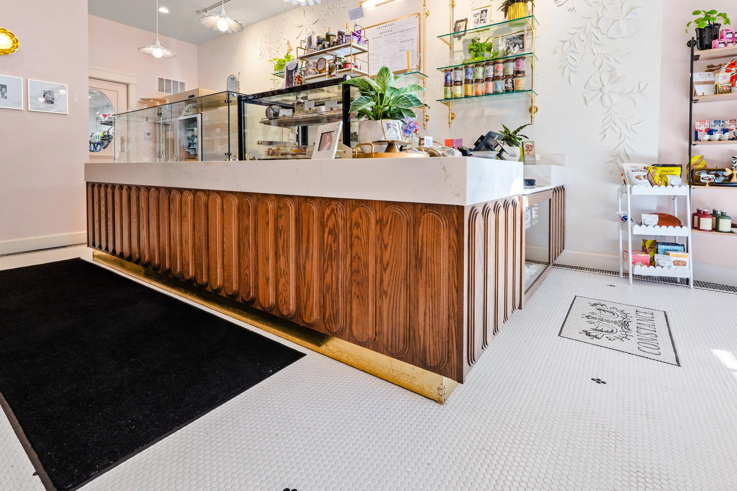 Charcuterie bar area and register area post-renovation.